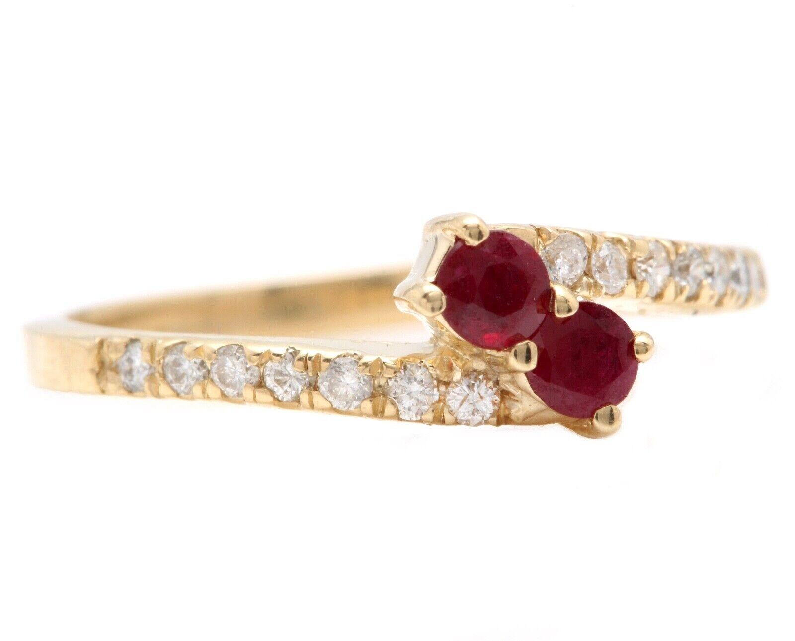 Impressive Natural Red Ruby and Diamond 14K Yellow Gold Ring

Suggested Replacement Value $2,000.00

Total Natural Round Cut Red Ruby Weight is: Approx. 0.25 Carats 
 
Natural Round Diamonds Weight: Approx. 0.15 Carats (color G-H / Clarity