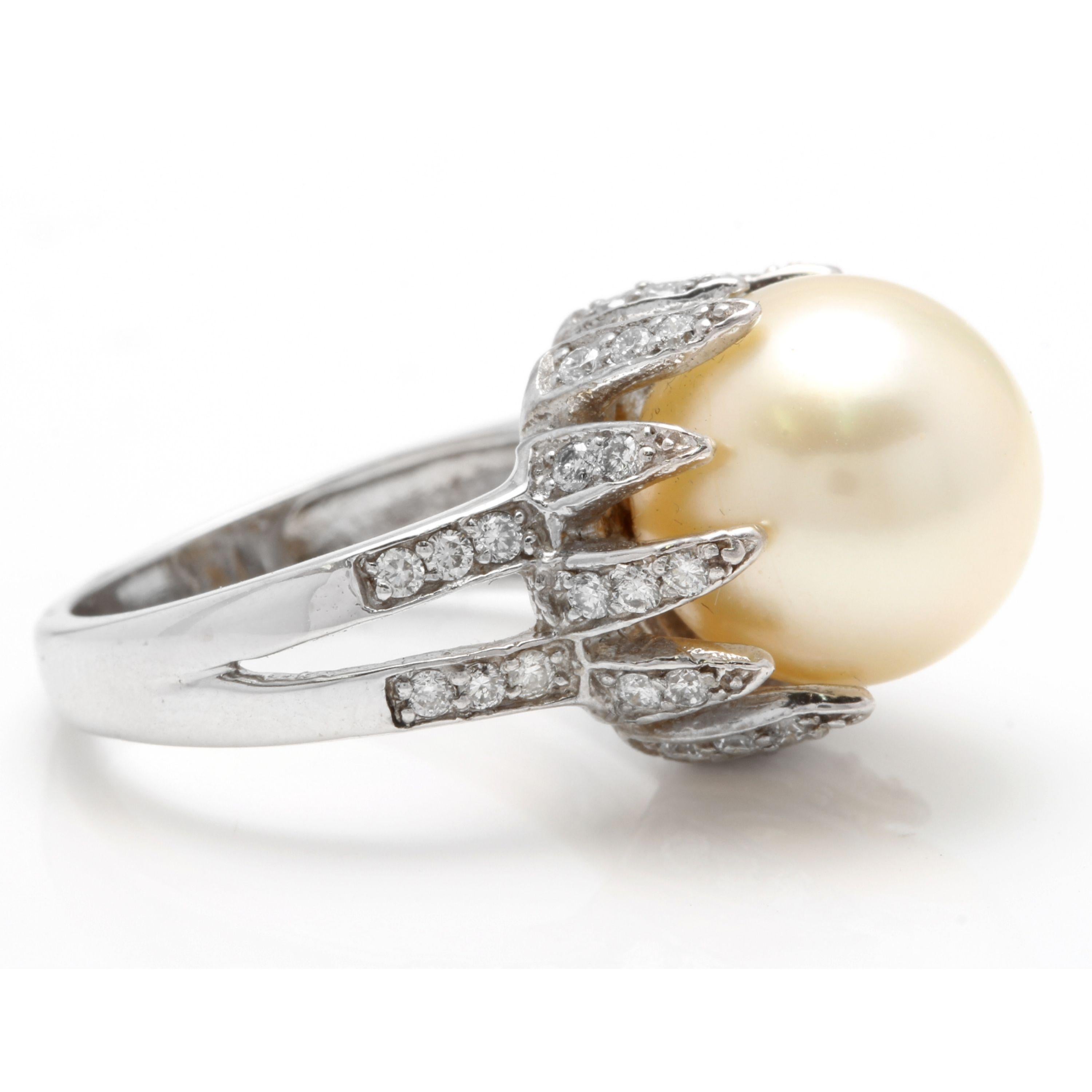 Splendid Natural South Sea Pearl and Diamond 14K Solid White Gold Ring

Stamped: 14K

Total Natural Pearl Measures: Approx. 12.50mm

Total Natural Round Diamonds Weight: Approx. 0.80 Carats (color G-H / Clarity SI1-Si2)

Ring size: 7 (we offer free