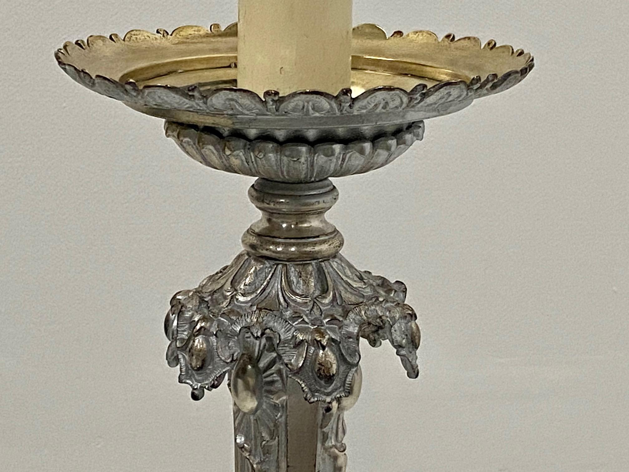 Very fancy French silverplate on bronze floor lamp having gorgeous detailed casting and new wiring.
No shade included.