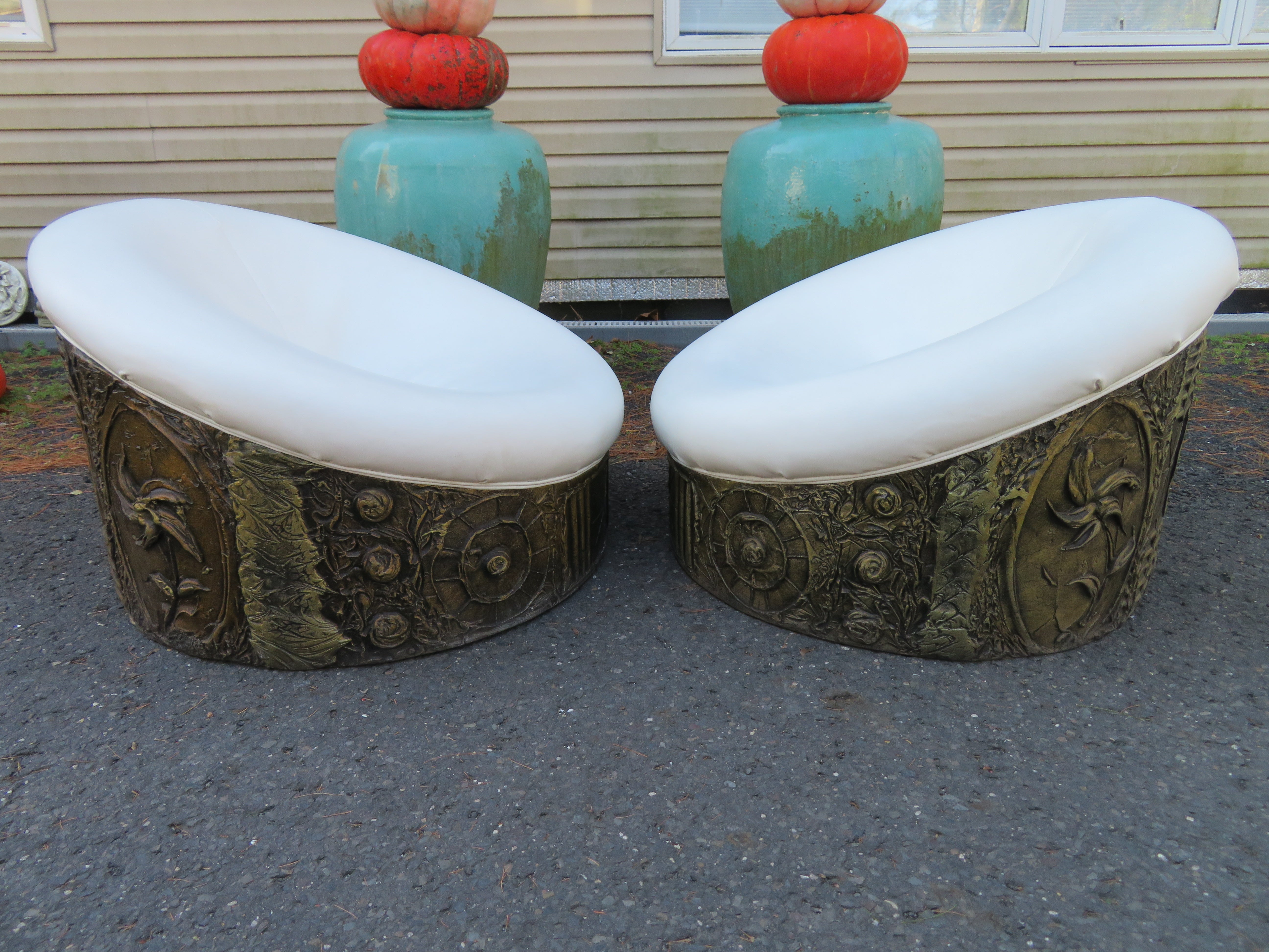 Amazing pair of Adrian Pearsall Brutalist pod lounge chairs. Chairs have rather newish white faux leather in nice clean condition, circa 1970s. They measure 23