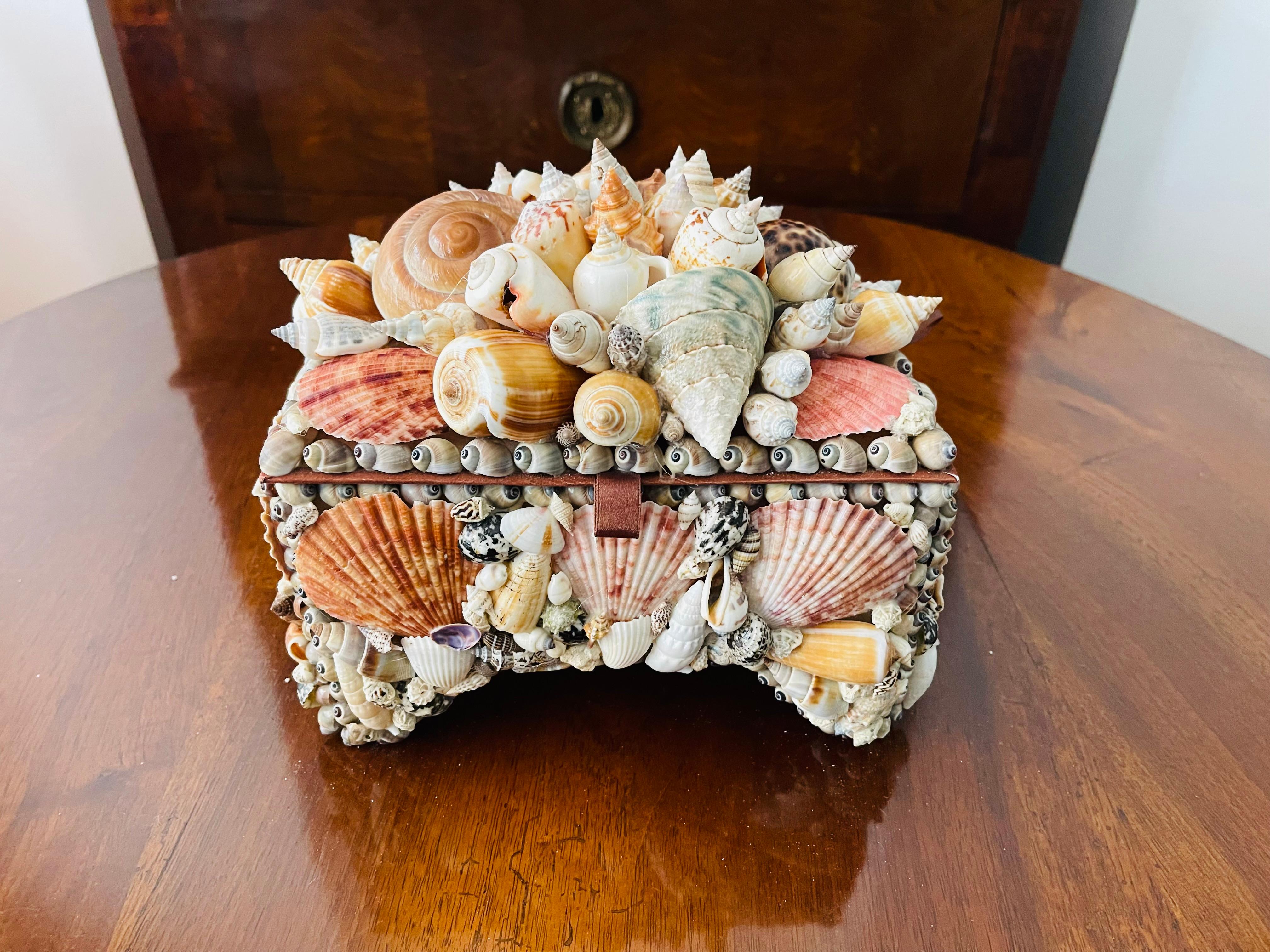 Spectacular richly encrusted with great selection of natural sea shells in Redmille style treasure box. Great decor piece or precious gift.