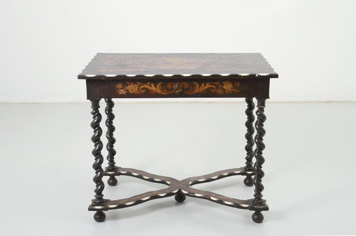 COD-CV106
Splendid side table with beautiful inlays in different woods and ivory on a ebonised pear wood structure. Central Europe, mid 19th century.