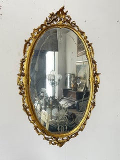 Splendido specchio ovale dorato, "Palazzo d'Oro", anni '70