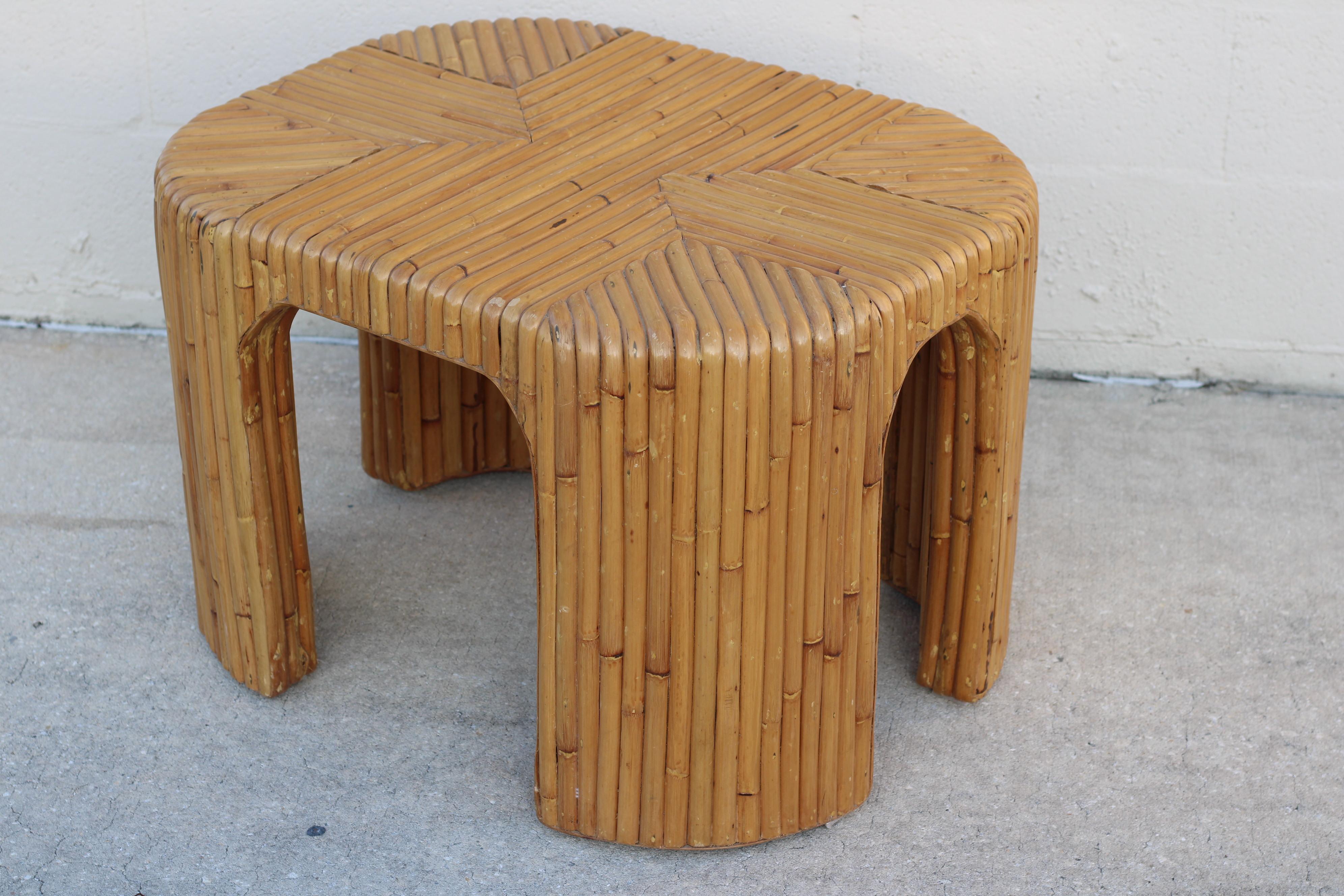 A pair of vintage organic modern split bamboo end tables with a distinctive geometric pattern, circa 1970s. Expertly made in the Philippines, these sturdy tables are beautiful and useful pieces that will introduce warmth and texture to a room.

A
