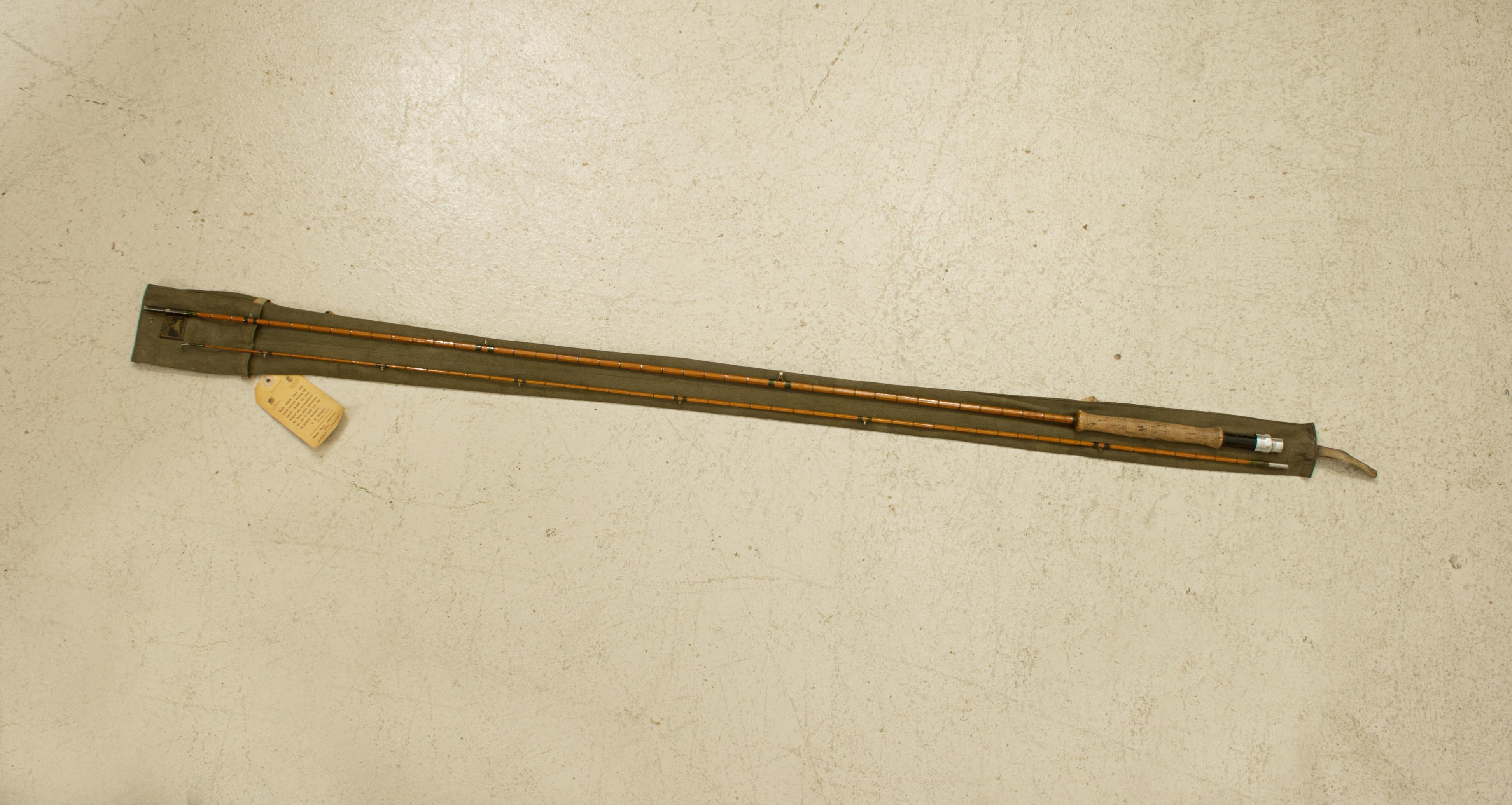 Vintage Two Piece Hardy Bros. Split Cane Fly Rod, Featherweight Perfection.
The Hardy 'Featherweight' is a split cane Palakona 2-piece rod made by Hardy's of Alnwick. The rod is in good used condition with green silk whippings, suction joints,
