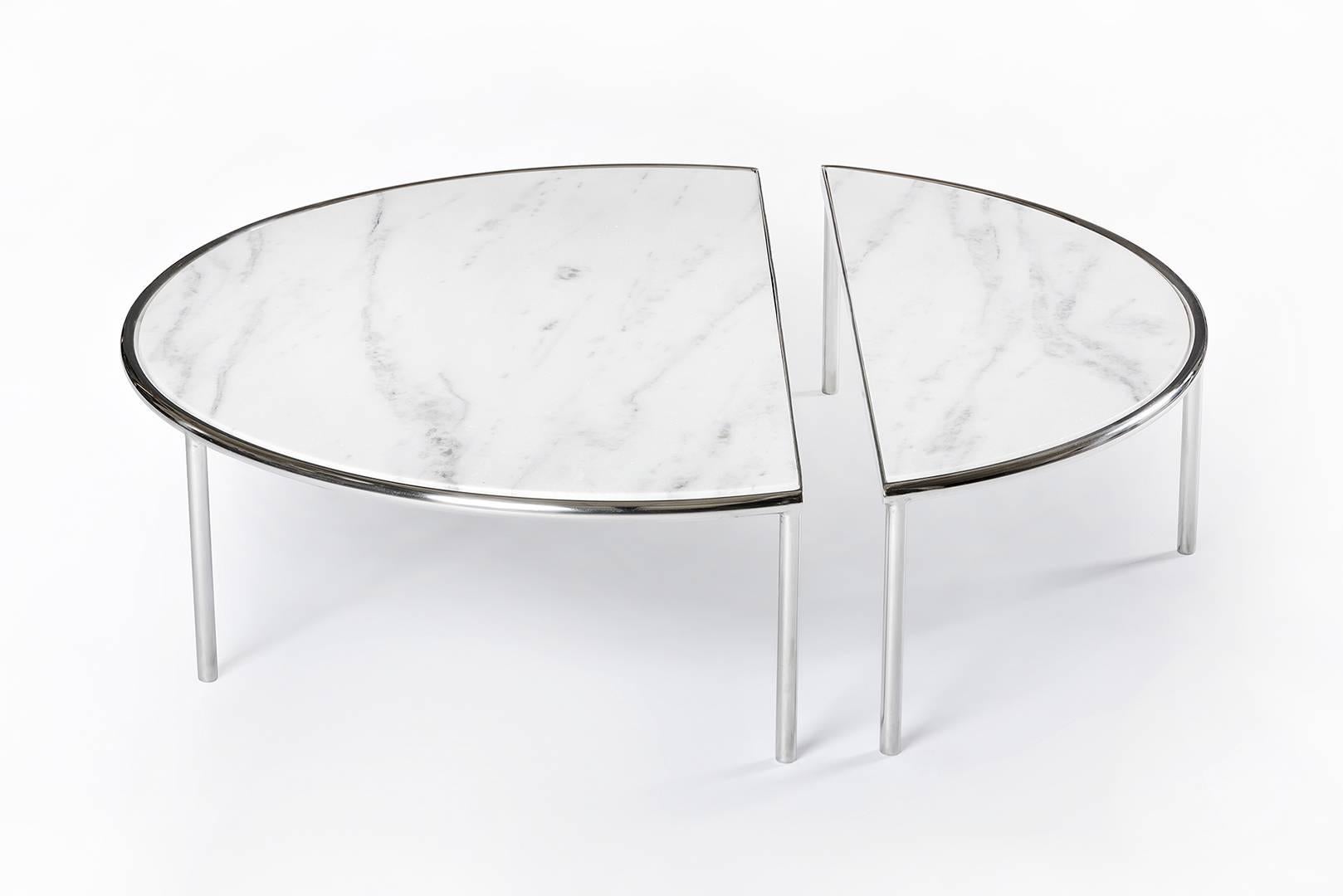 Split tables are the result of a subtle intervention in simple geometric forms. A circle and a square are cut, creating tables composed of two independent parts that visually maintains its unity.

The gesture attributes possibilities of