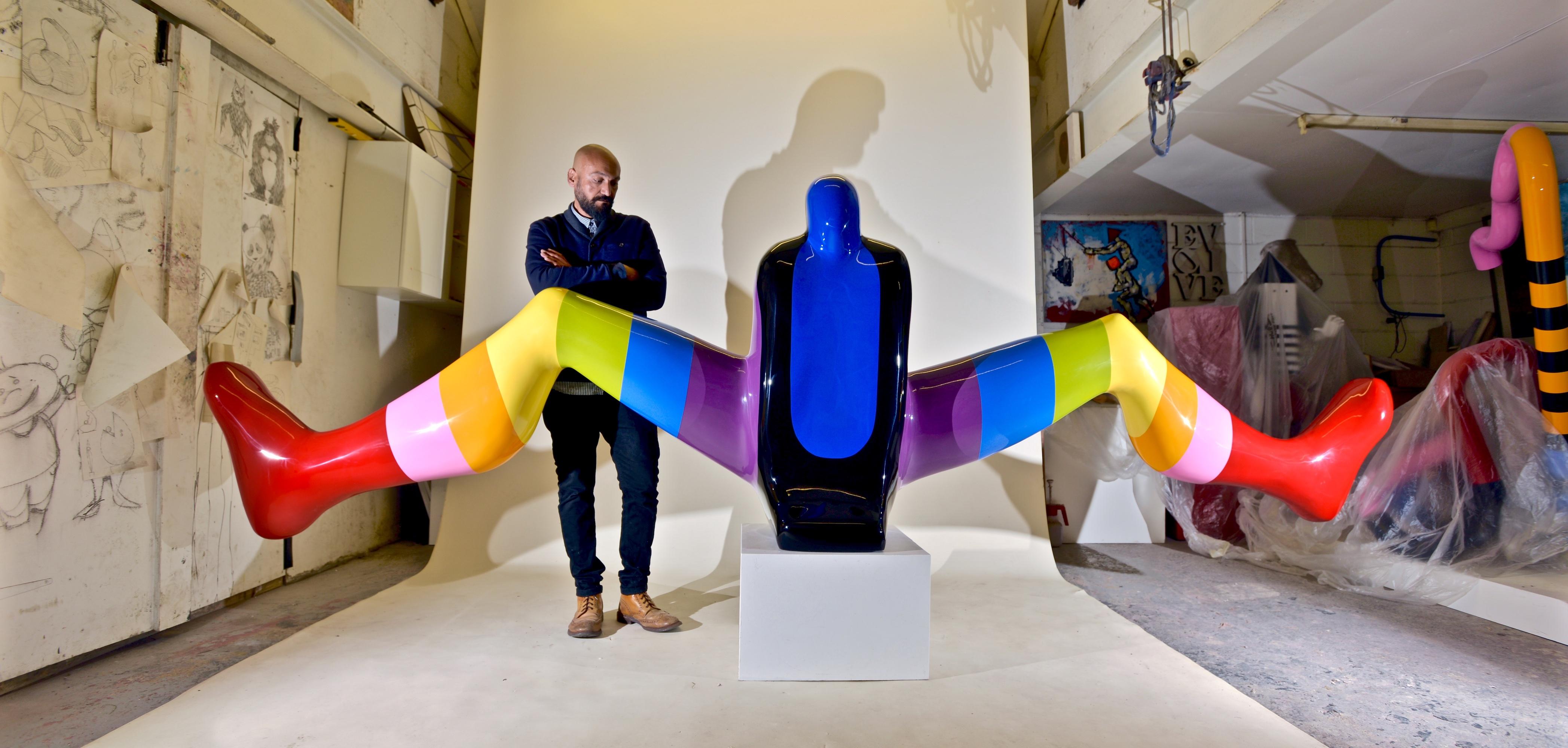Graduating in 1997 with a first class BA degree with honors from Helwen University of Fine Arts in Cairo, Egyptian born sculptor Sam Shendi creates joyfully coloured abstractions of the human figure which, with the subtlest of indicators, hint at