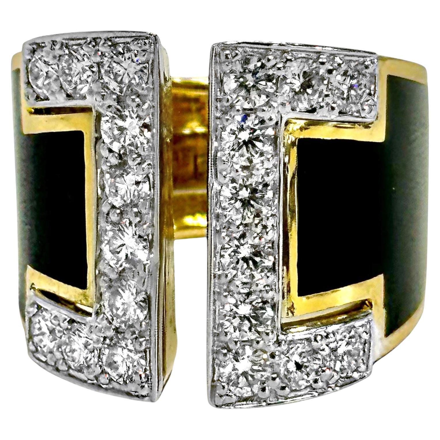 This striking 18k and platinum modern split front cocktail ring is actually palpable in it's appeal. On each side of the very edgy open channel are a line of brilliant cut diamonds set in raised platinum plates. Twenty brilliant cut diamonds have a