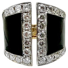 Ring aus 18 Karat Gelbgold mit geteilter Front und schwarzer Emaille und Diamanten
