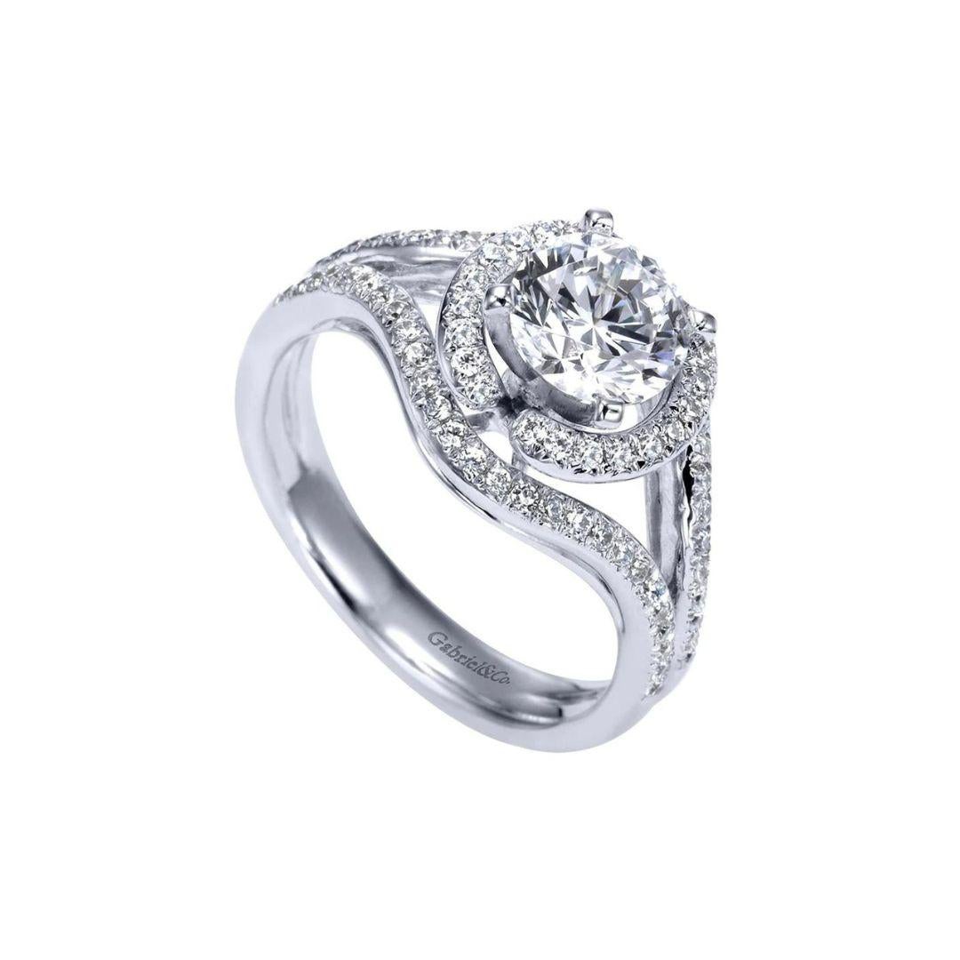 Split Pave Halo Design Diamond Engagement Mounting in 14k White Gold. Center diamond NOT included, fits one to two carat stone. Side diamonds weigh a total carat weight of 0.36 ctw, H color, SI clarity.