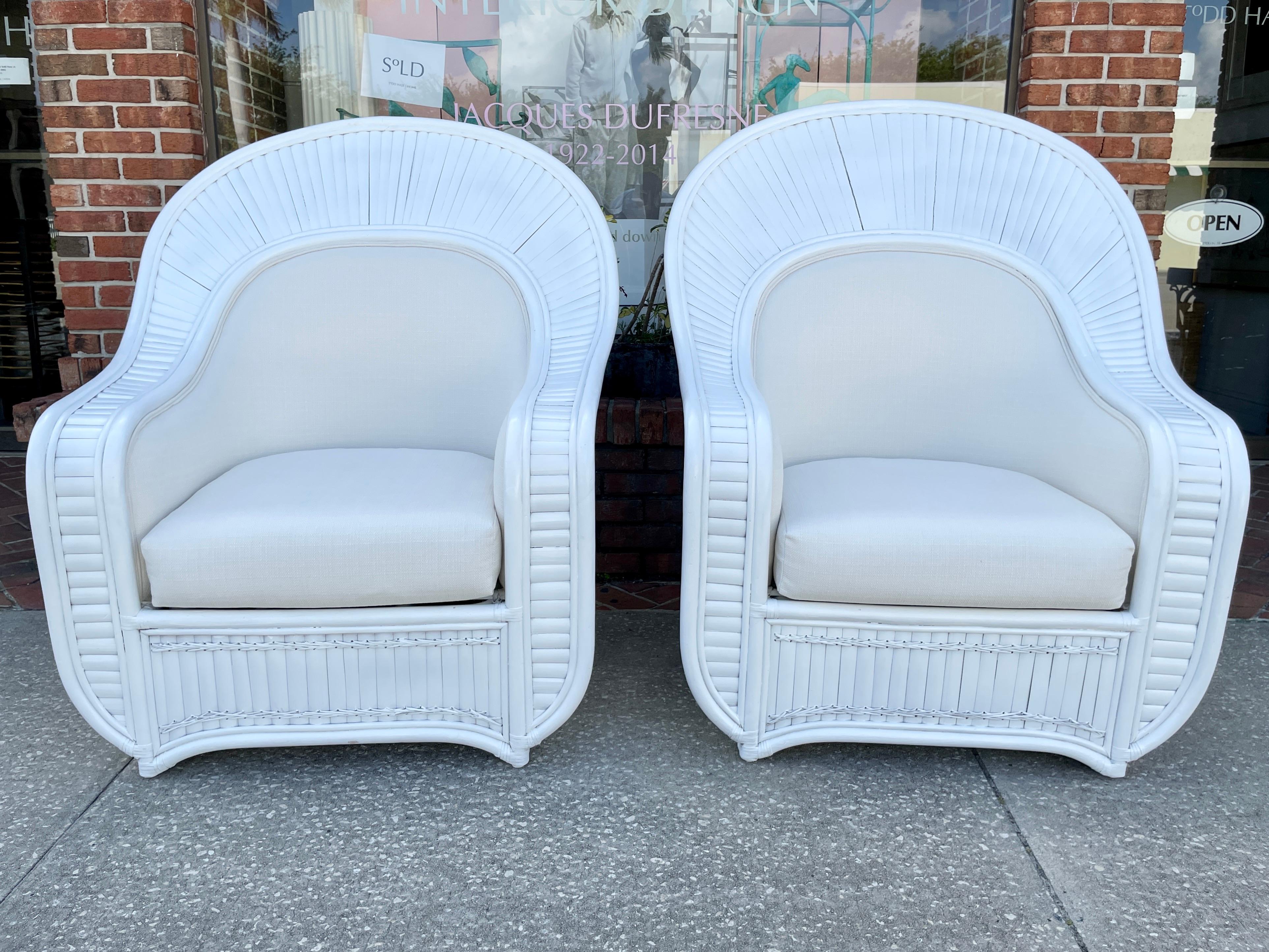 Fabulous pair of freshly lacquered in white boho chic extra large club chairs in new Todd Hase Textiles. Great addition to your boho chic inspired home. These are very rare Split Rattan Fan back club chairs.
