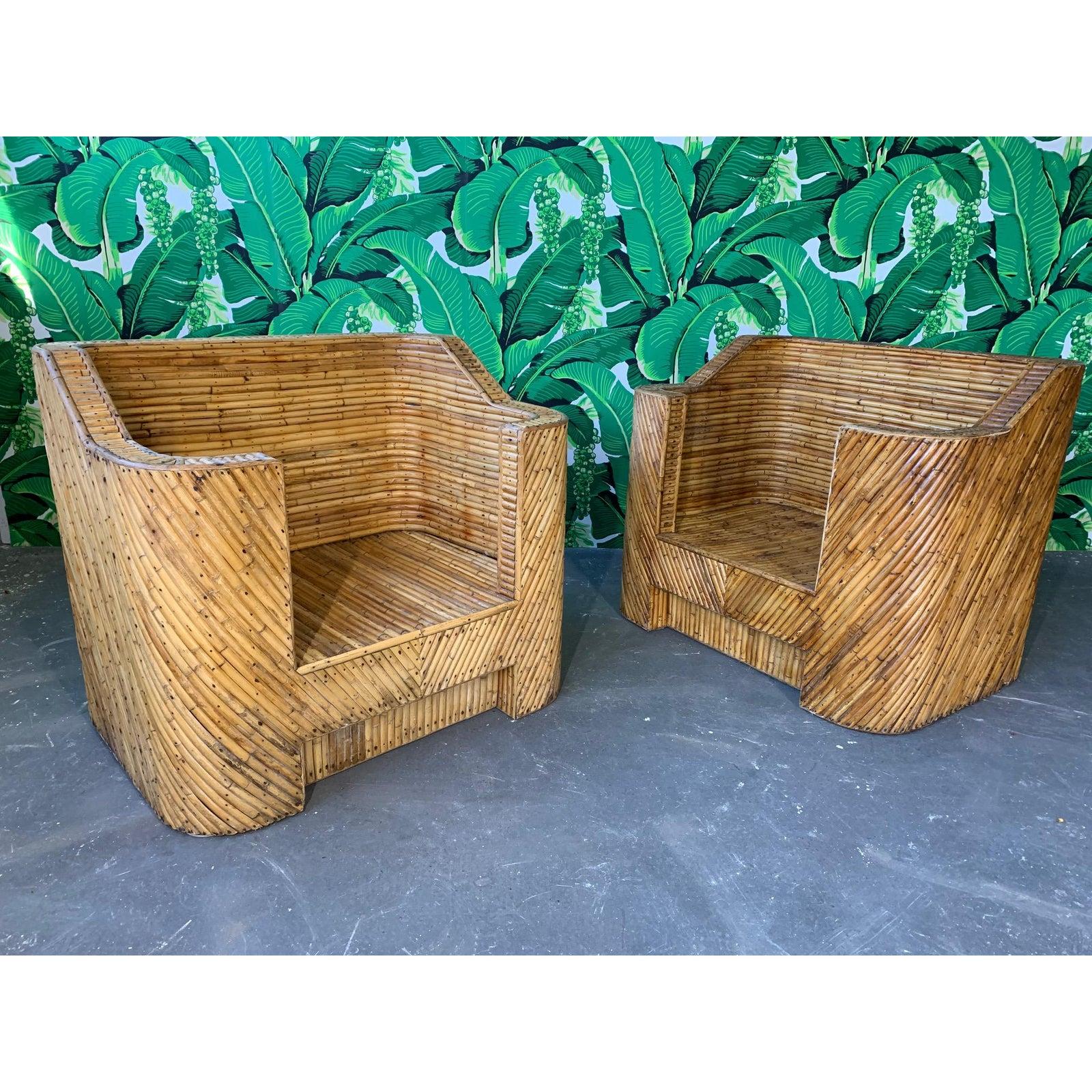 Vintage split reed bamboo club chairs circa 1960s purchased by original owner in Guam. Very heavy, excellent construction, minor signs of age appropriate wear to finish.