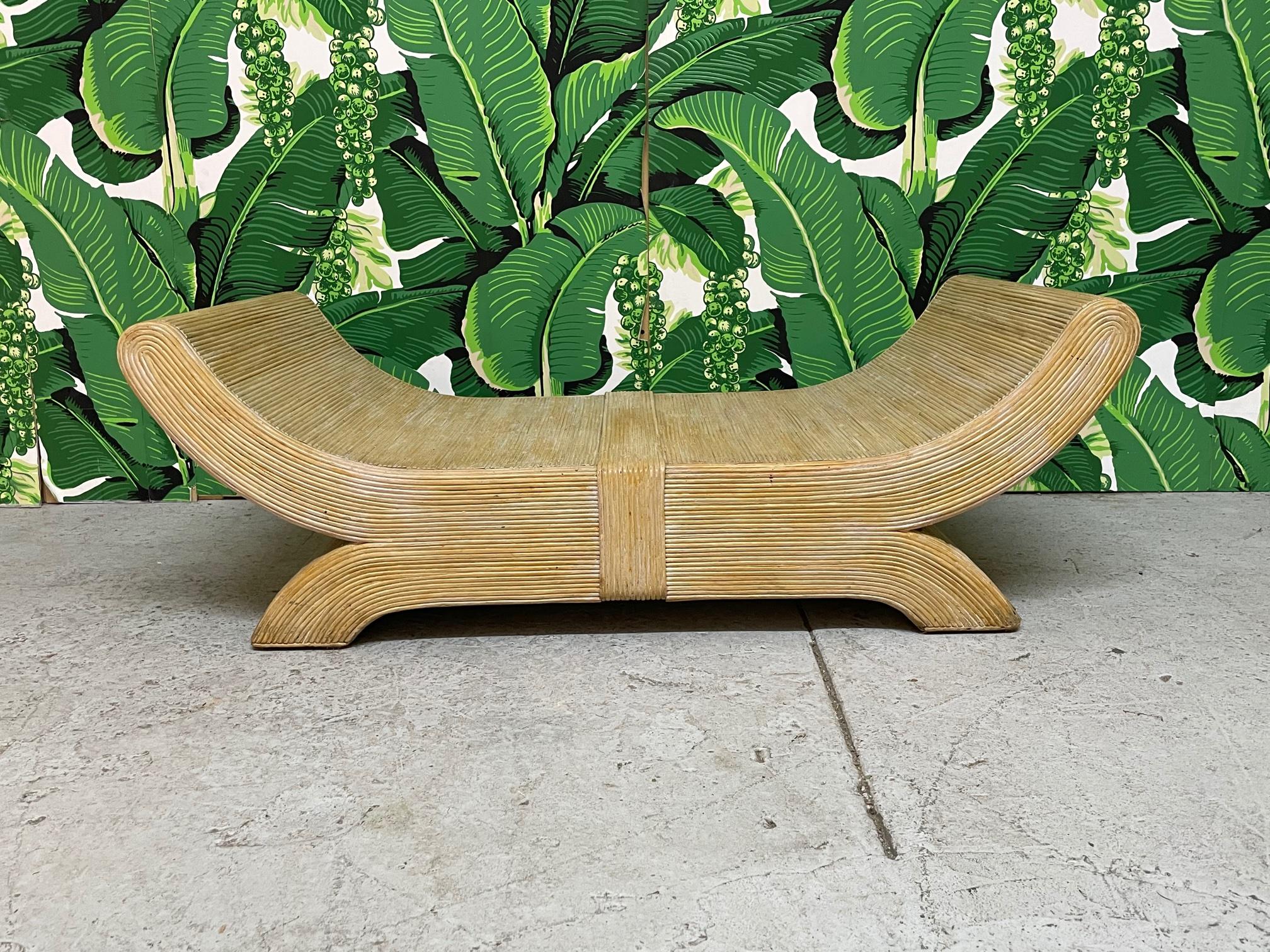 Vintage emperors seat/bench by Betty Cobonpue. Pencil reed rattan veneer over wood structure. Part of Cobonpue's Scultura series. Very good condition with only very minor imperfections consistent with age.