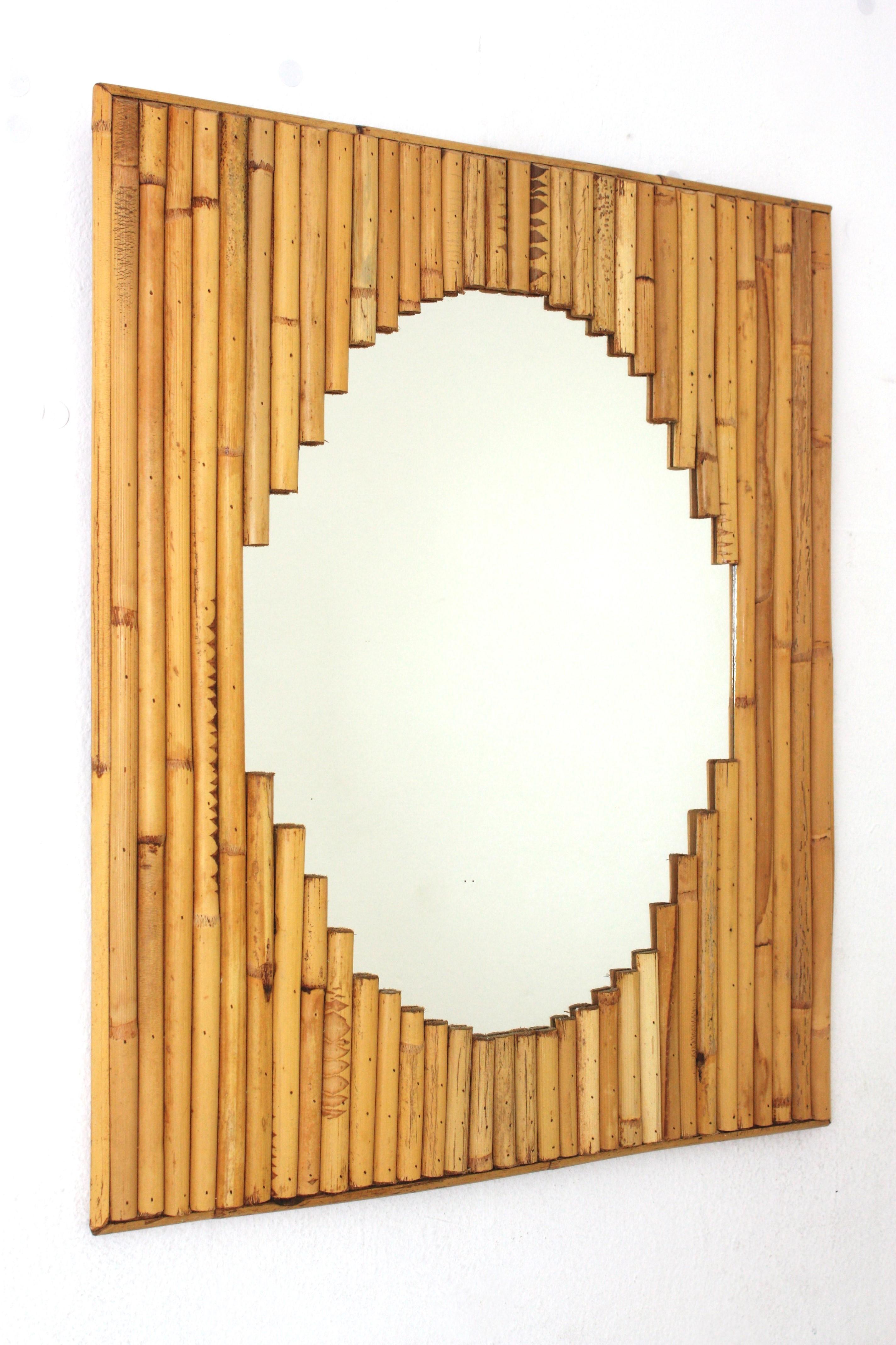 Mid-Century Modern Split Reed Rectangular Mirror Framing Oval Glass For Sale