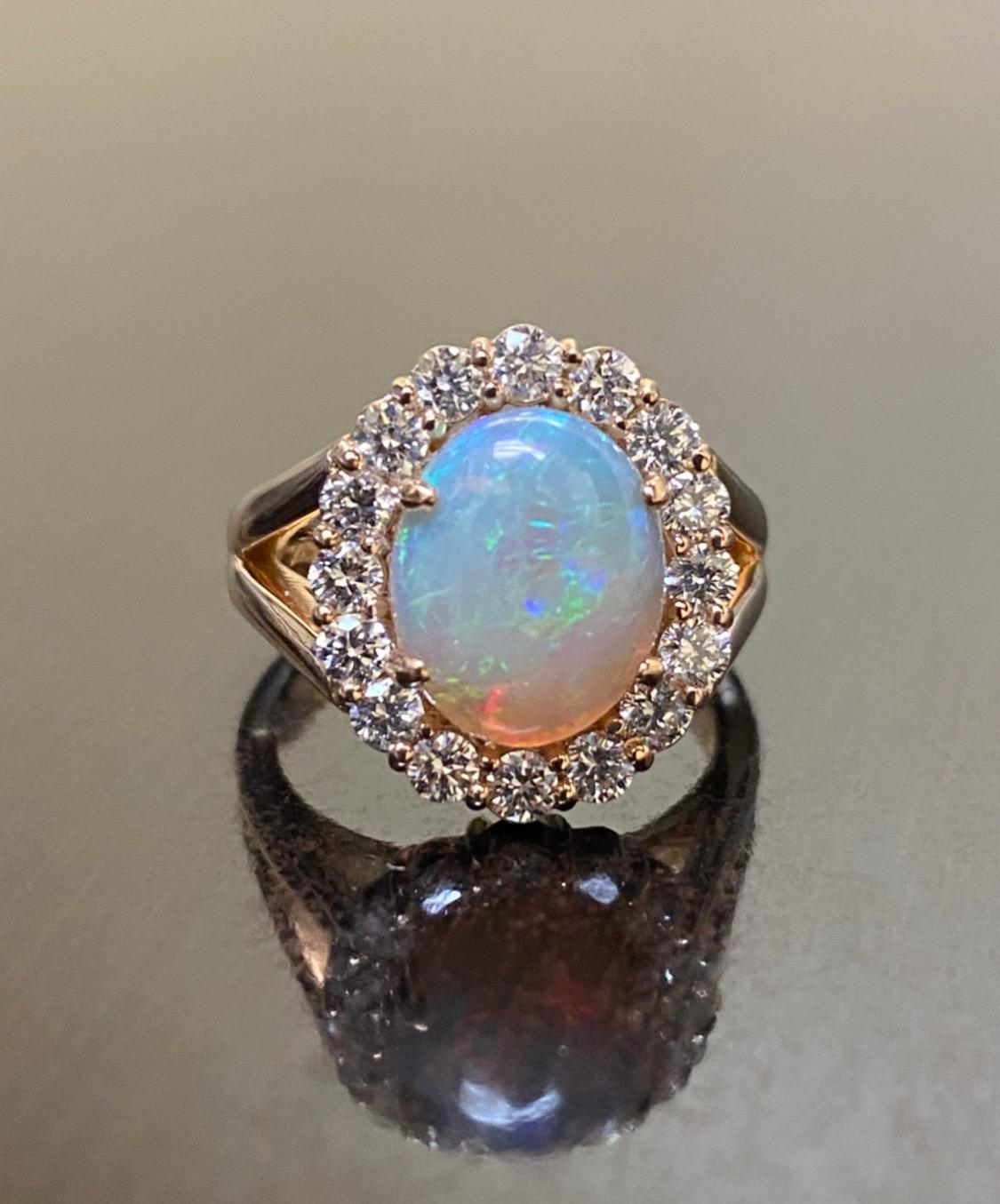 DeKara Designs Collection

Our latest design! An elegant and lustrous Opal cabochon surrounded by beautiful diamonds in a halo setting.

Metal- 18K Rose Gold, .750.

Stones- Center Features an Oval Fiery Australian Opal Cabochon Cut 2.40-2.60 Carats