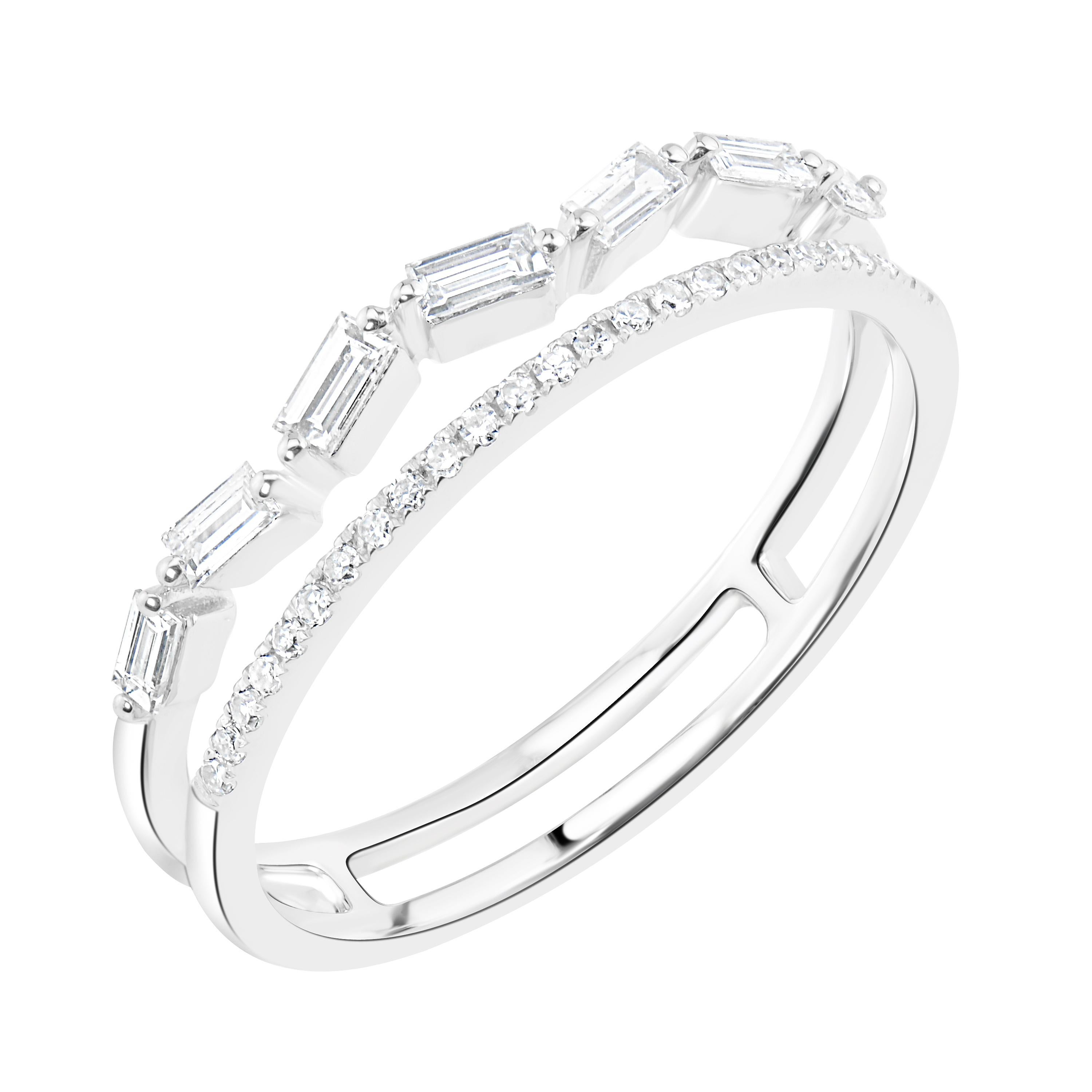 This Luxle Split Shank Band Ring hosts a beautiful display of sparkle. Rendered in 14K white gold, this band ring dazzles with 6 baguette diamonds and 25 pave set round diamonds in a chic split shank design. This white gold ring is showcased with