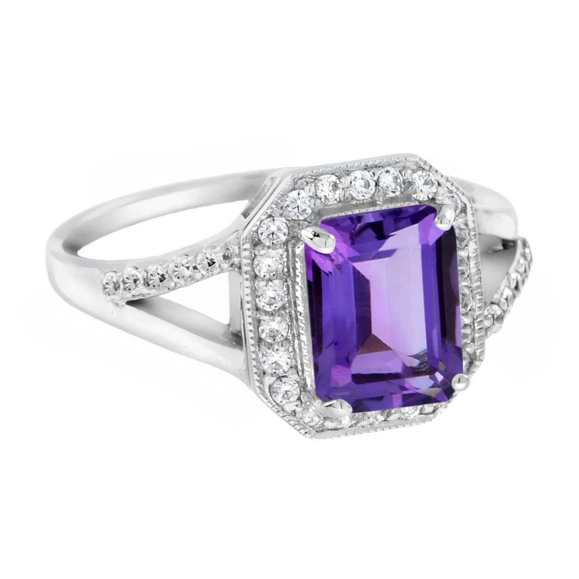 This exceptional setting features a halo of diamond accents that curves gently around the cushion Amethyst for a distinctive look. Two rows of diamonds sparkle on the contemporary split shank band, while a surprise row of diamond accents on the