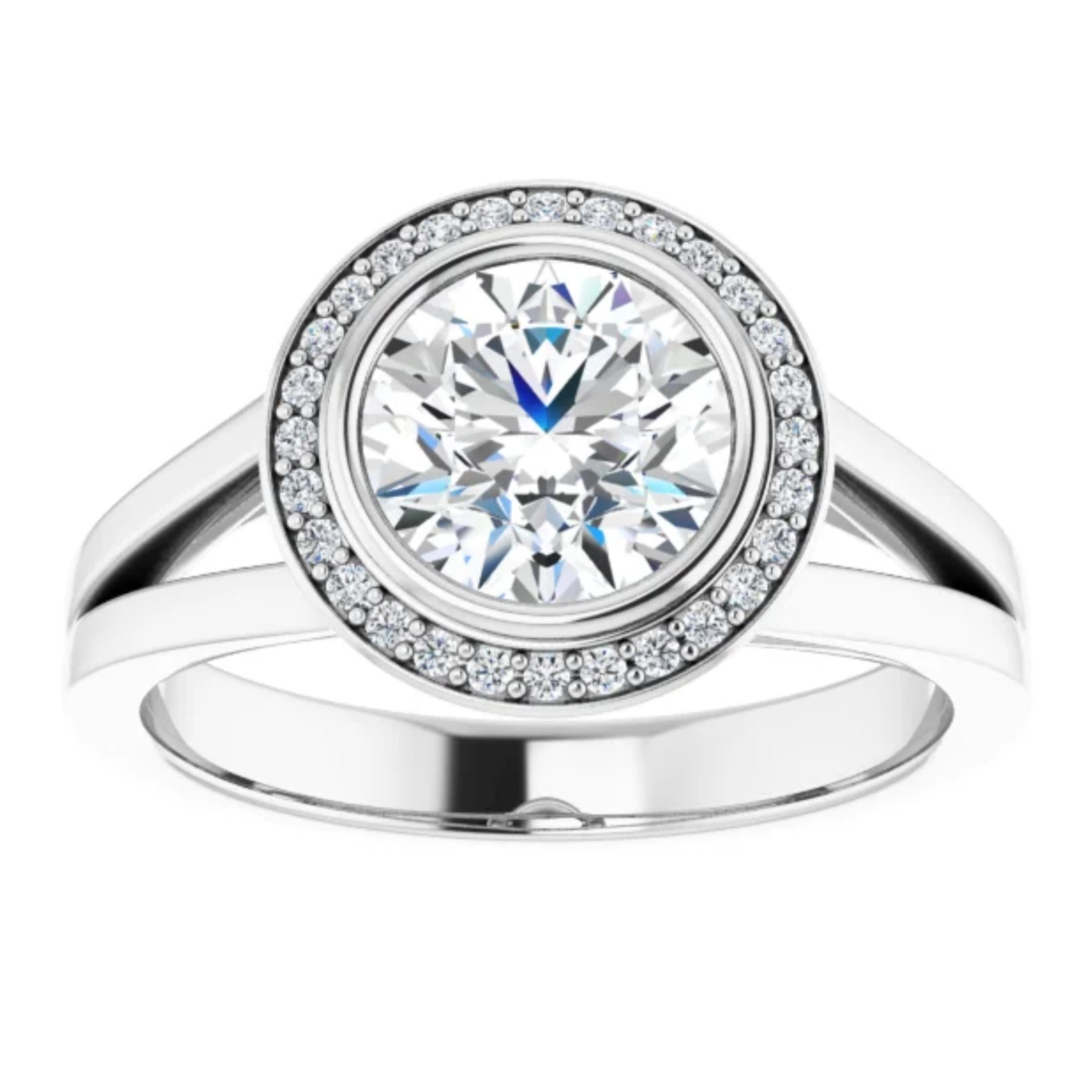 The plain shank of this engagement ring splits as it reaches the center stone on this engagement ring. A halo of shimmering white diamonds surrounds the GIA certified center diamond.

Style Number: ScintilleNora-1872653

Center Stone:
1 Round