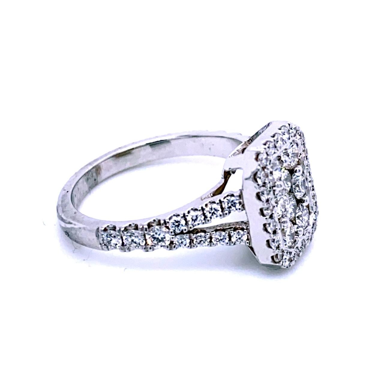 This beautiful Split Shank Diamond Engagement Ring with Halo has a rectangular center wet with a cluster of round diamonds (Size 6.5x8.0 mm Equivalent to a 2 Ct Radiant). Total diamond weight of 1.07 Ct.

Center dimensions 6.5 mm x 8.0 mm 
Total