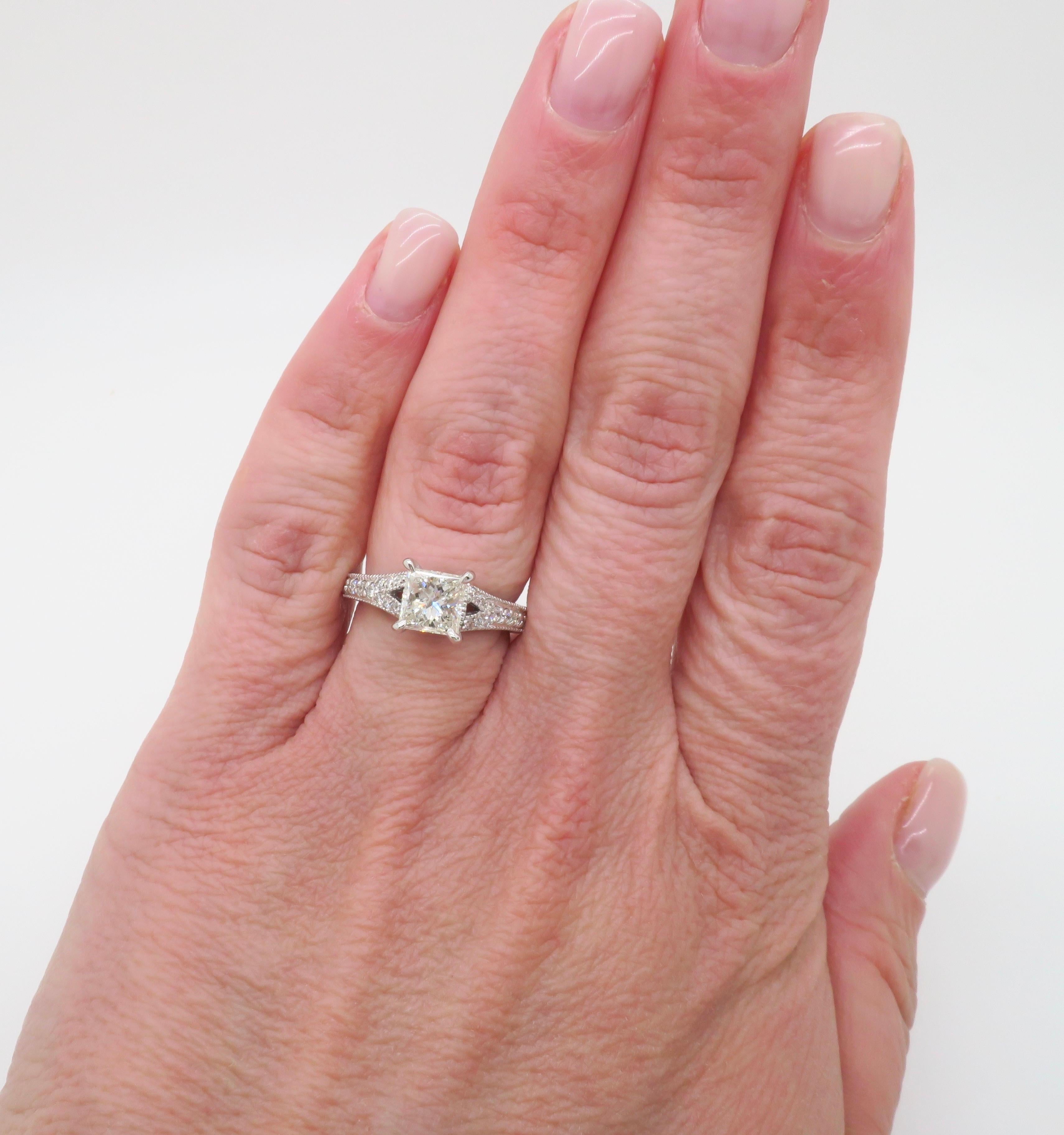 Beautiful split shank diamond ring made in 14k white gold featuring a 1.05ct Princess cut diamond. 

Center Diamond Carat Weight: 1.06CT 
Center Diamond Cut: Princess 
Center Diamond Color: H
Center Diamond Clarity: SI2
Metal: 14k White Gold