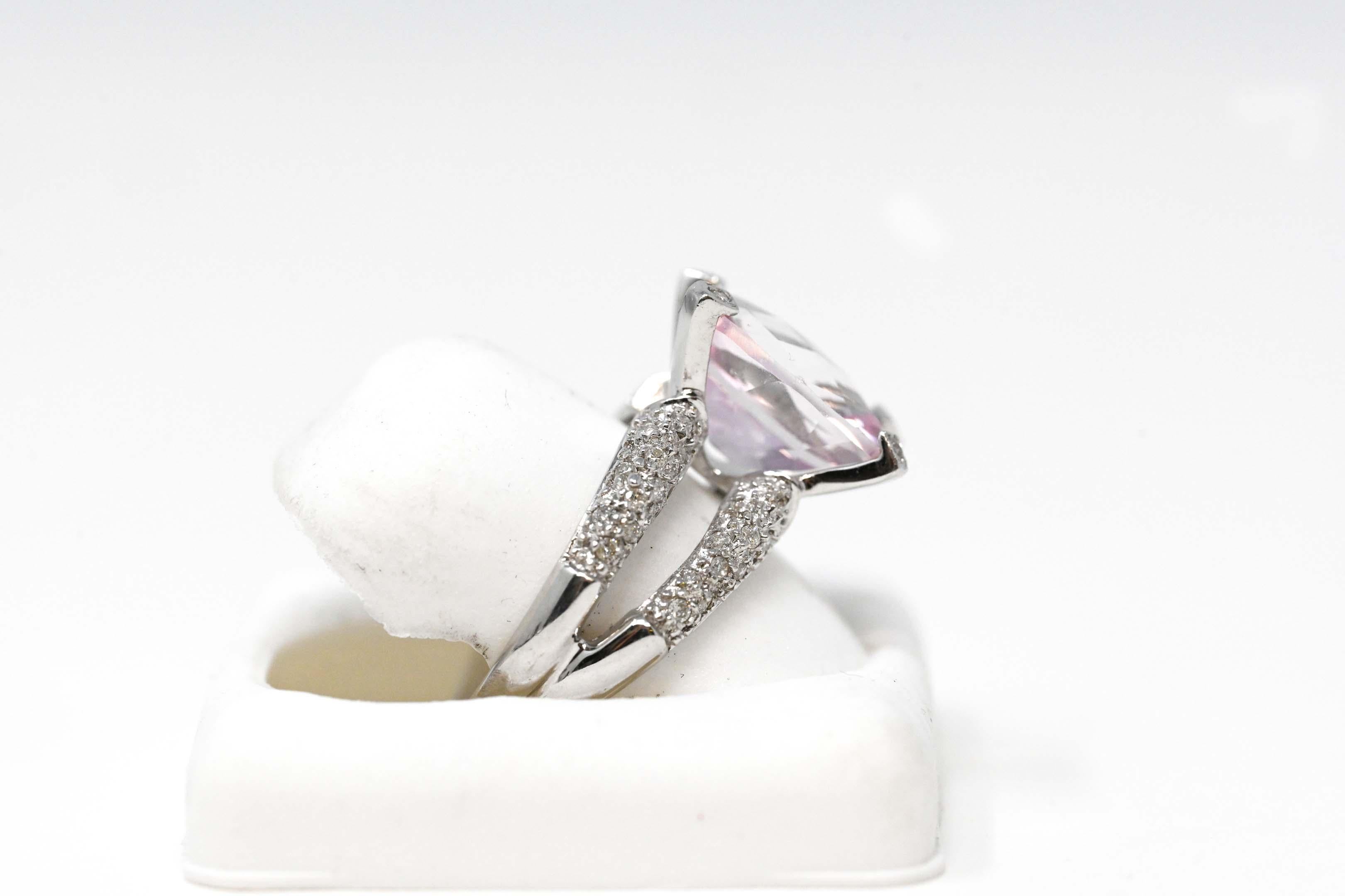 One (1) ladies ring in white 18 karat gold (stamped) split shank style, polished and rhodium finish. Total weight of 6.2 grams. The ring is set with forty-one (41) round brilliant cut diamonds, average weight 0.0075 carat each, total weight 0.30