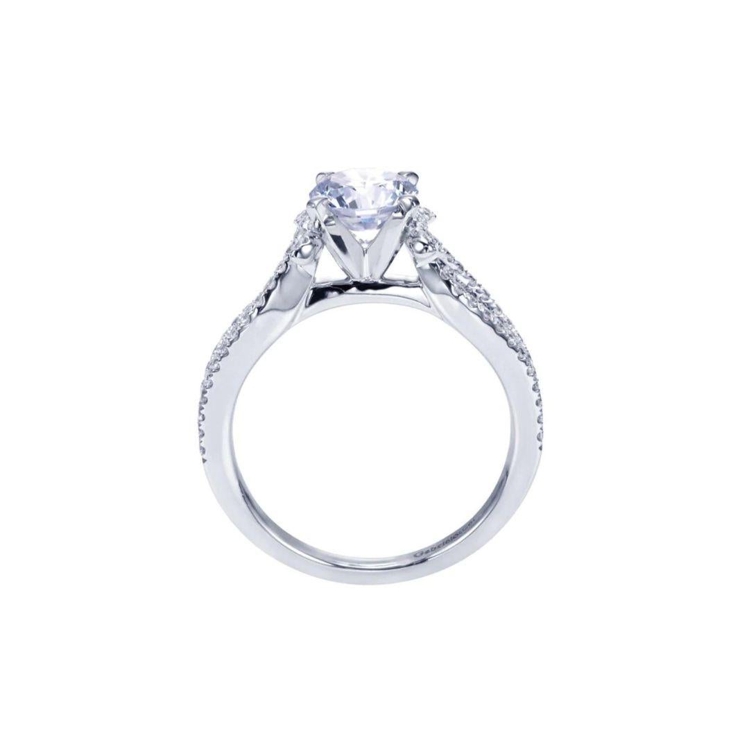 Ladies' 14k White Gold Diamond Engagement Mounting﻿. Romantic scalloped design combined with delicate pave diamonds and exquisite milgrain give this unique ring a playful enigmatic look. Part of Gabriel and Co Engaged collection. Center diamond NOT