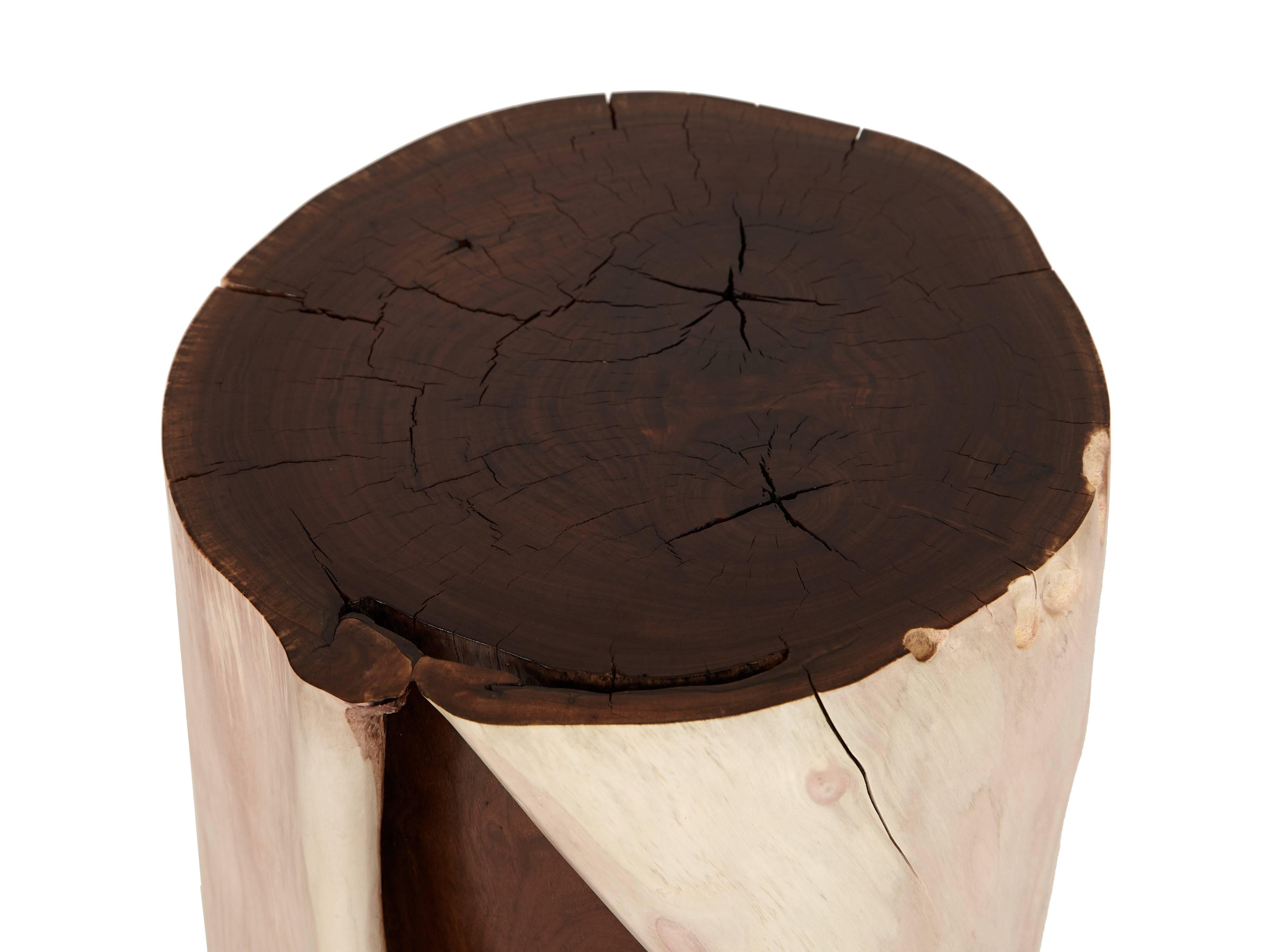 Split walnut table /stool by Caleb Woodard from solid and bleached walnut, circa 2017. Hand-carved highly sculpted organic form kiln dried to control splitting over time finished with a white oil hand rubbed finish.

Caleb Woodard is a designer