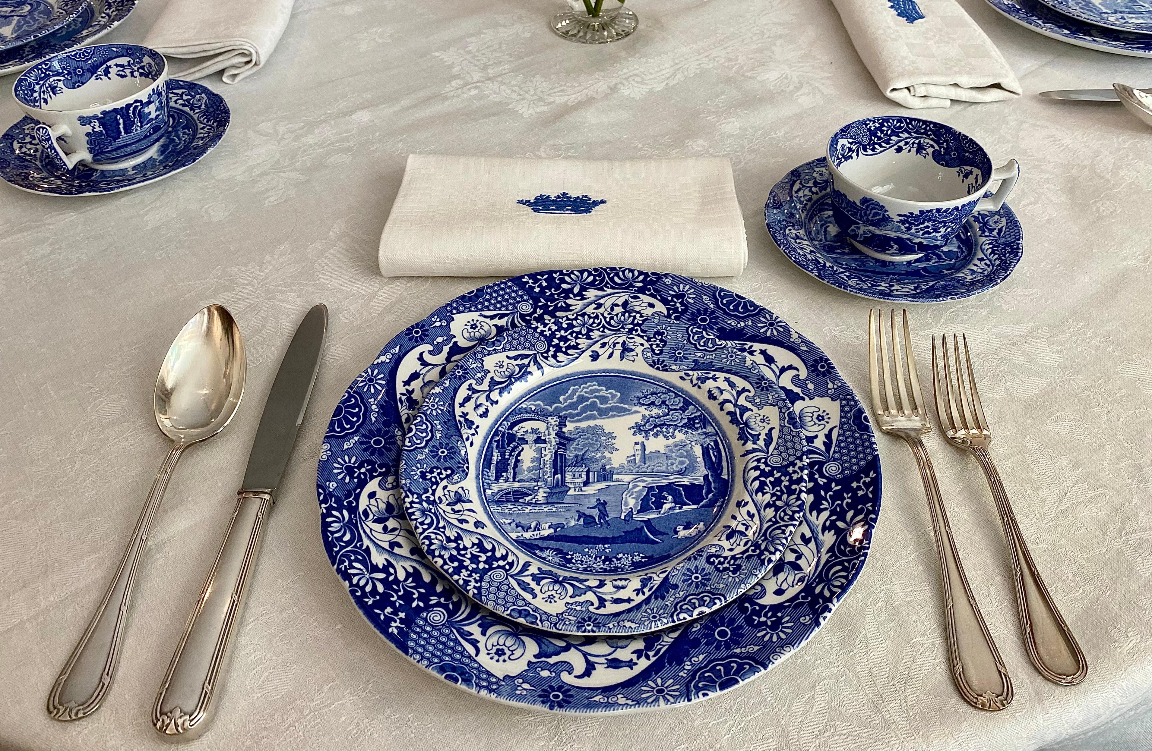 81 pieces crafted using fine earthenware porcelain make up this classic collection by Spode. The Blue Italian design depicts a scene in the Italian countryside with natural elements such as trees and animals that evoke memories from international