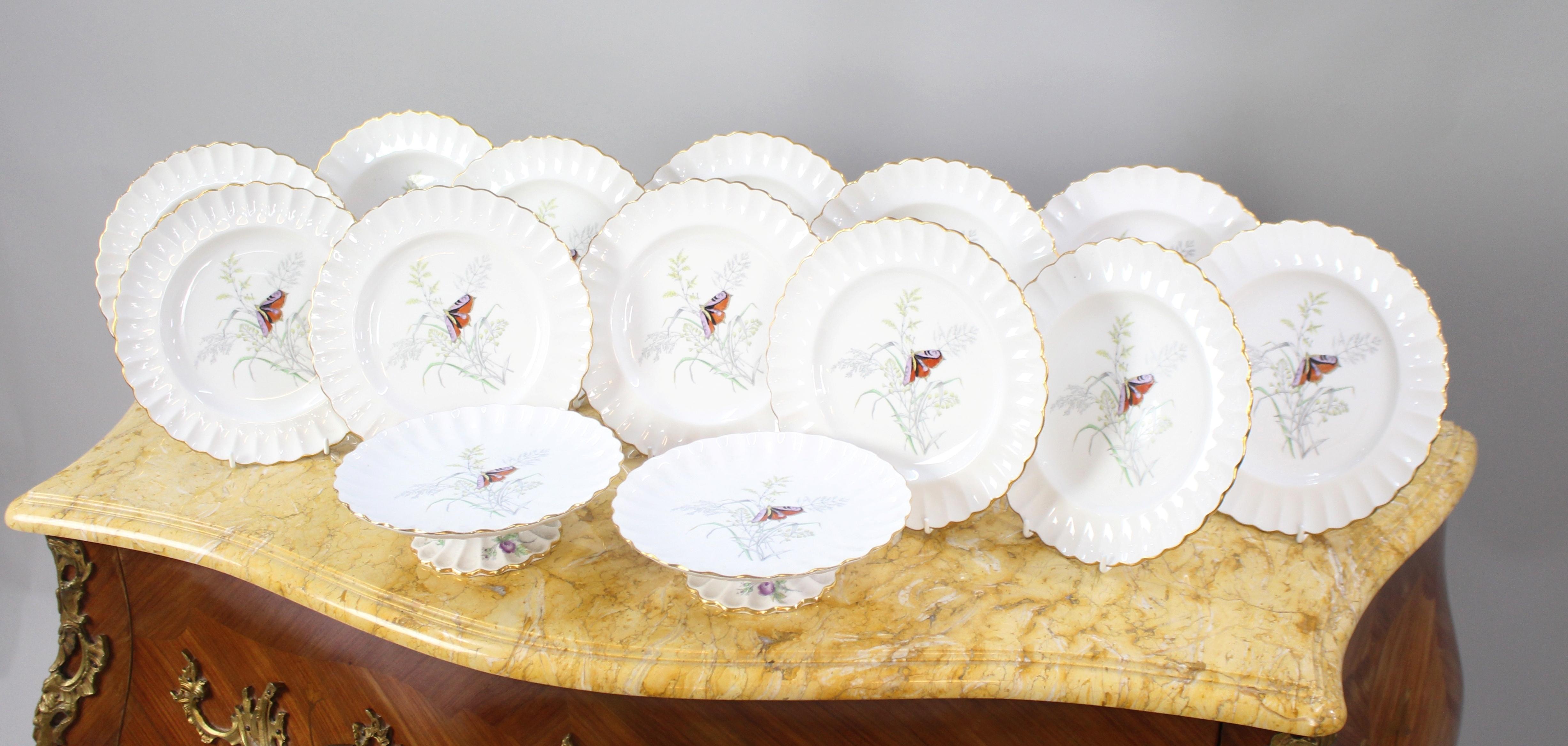 Spode 'Butterfly' Pattern Dessert Service, 14 Pieces, Dated 1954

A fine vintage Spode dessert service in the 'Butterfly' pattern (Y7378), dating from 1954. The service is decorated with butterflies amidst grasses and foliage, with a fluted border
