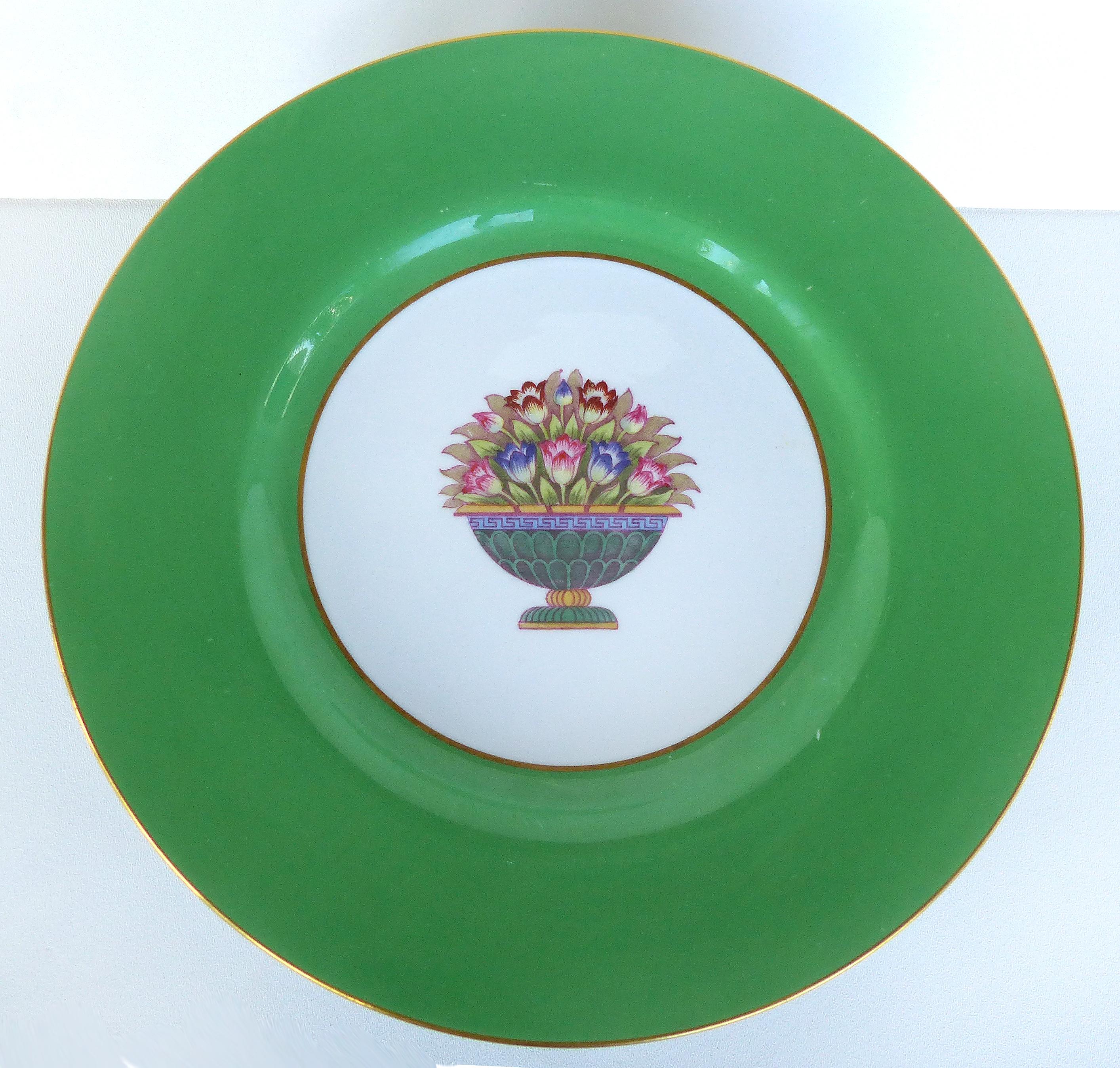 Offered for sale is a lovely set of 12 Spode Copelands China dinner plates from England originally retailed at Martin, Washington, D.C. We have done extensive research and have yet to find other examples of this pattern that we recently acquired