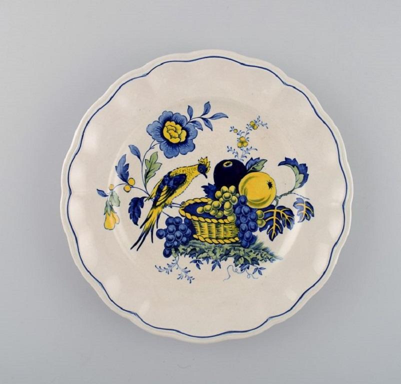 Spode, Inglaterra. Servicio Pájaro Azul de porcelana pintada a mano. 
Dos tazas de té con platillos, dos platos y dos mantequeras. Años 30 / 40.
Diámetro de la almohadilla para mantequilla: 14,7 cm.
La taza de té mide 9,5 x 5,3 cm.
Diámetro del