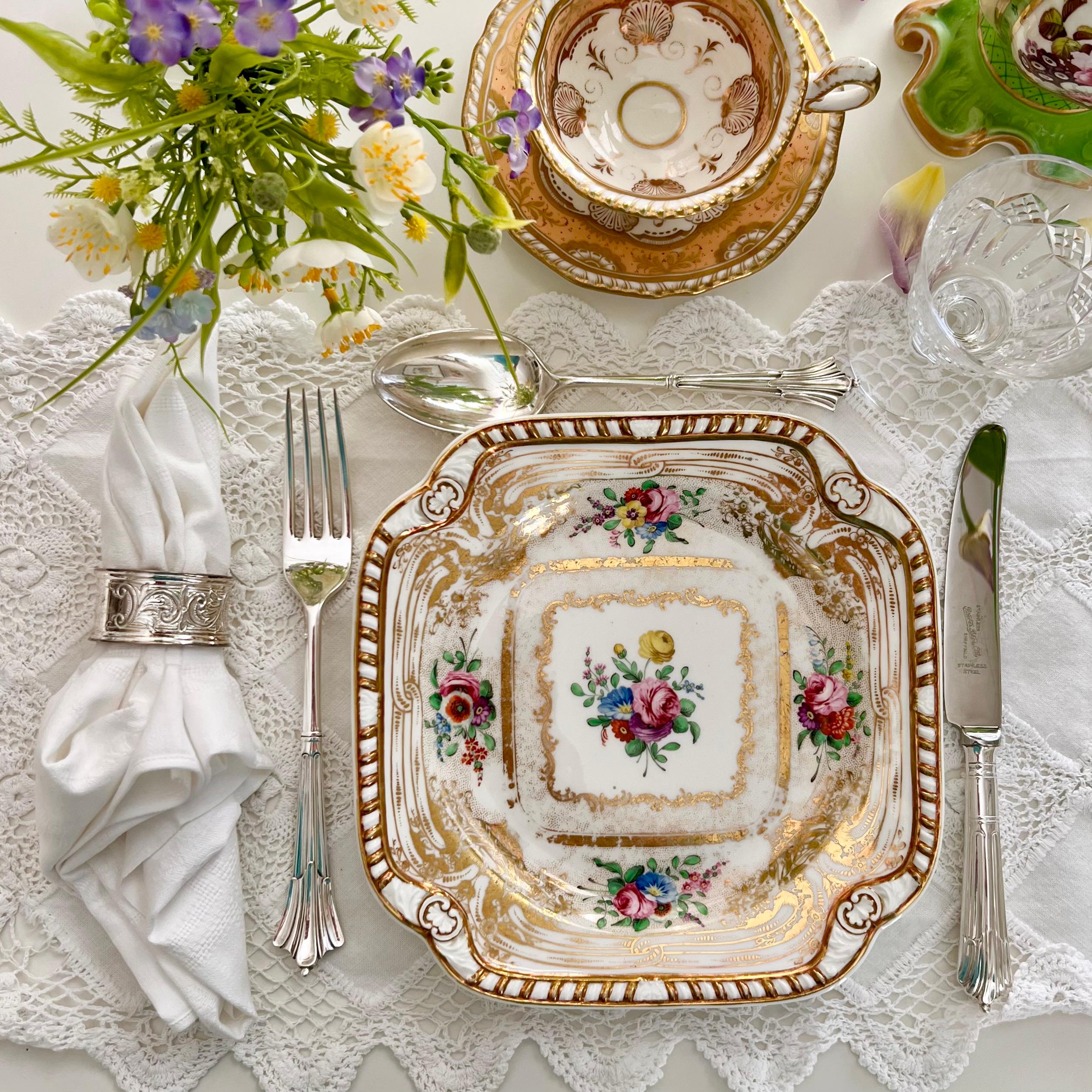 This is beautiful square dessert plate made by Spode around the year 1824. The set was made in the famous Spode Felspar china, which was a bright porcelain that included felspar rock, making it exceptionally robust and very suitable for large table