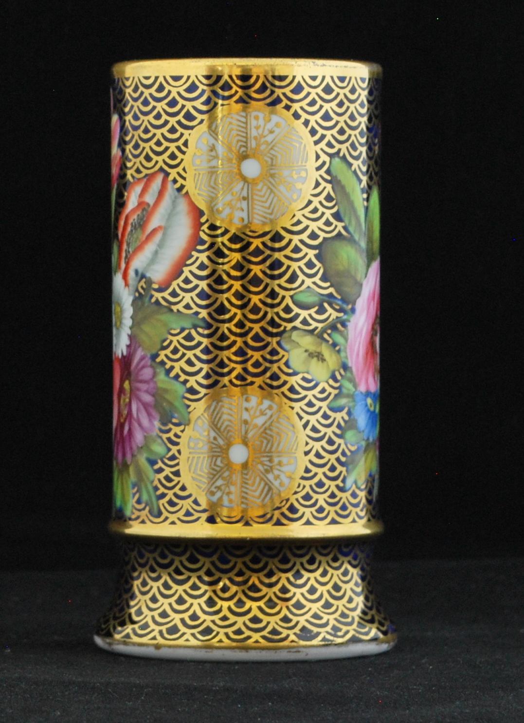 A spill vase in bone china, decorated with pattern 1166.