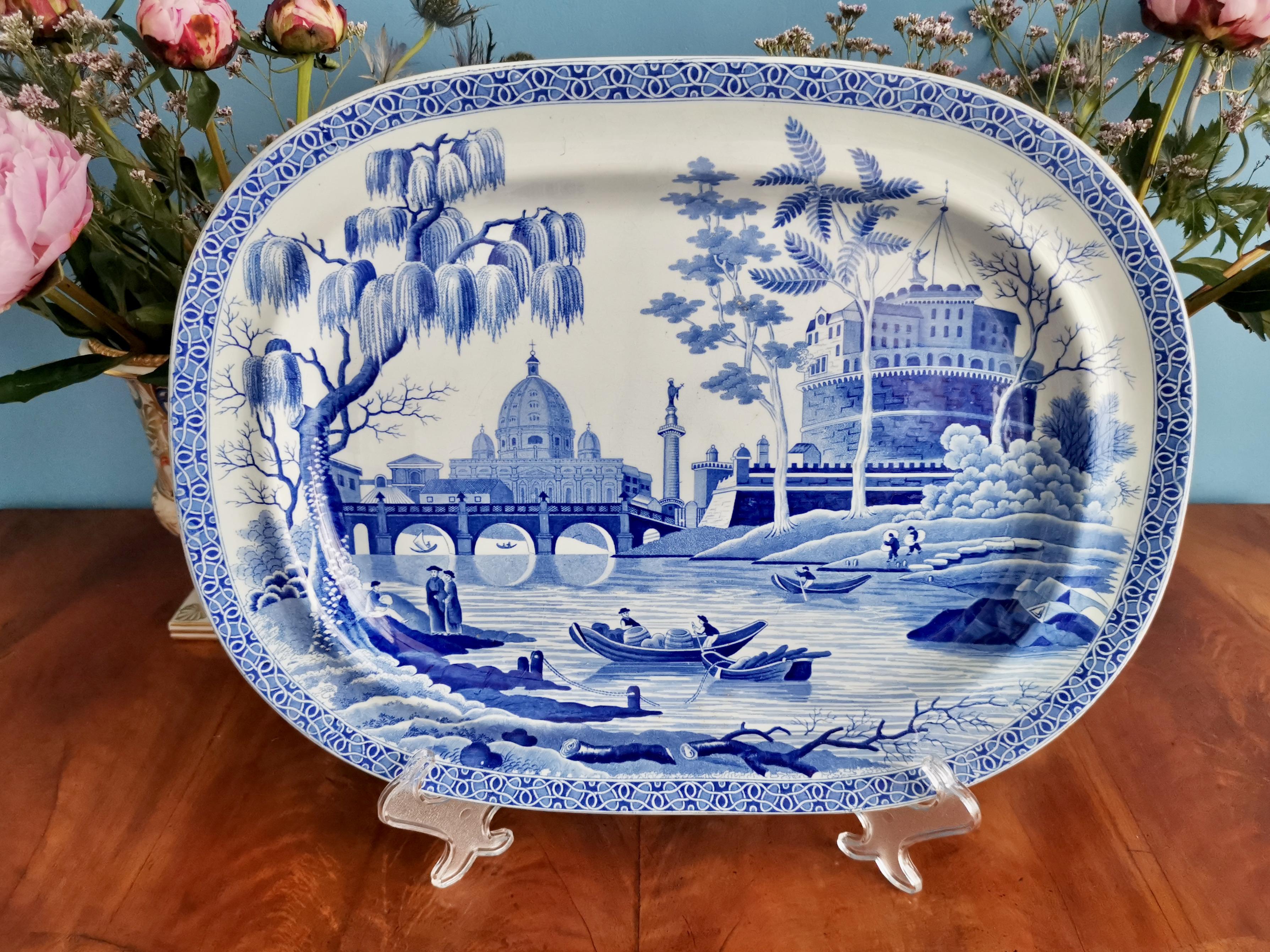This is a beautiful meat platter made by Spode between 1811 and 1833. The platter is made of pearlware and in immaculate condition. It is decorated with a superbly executed blue and white 