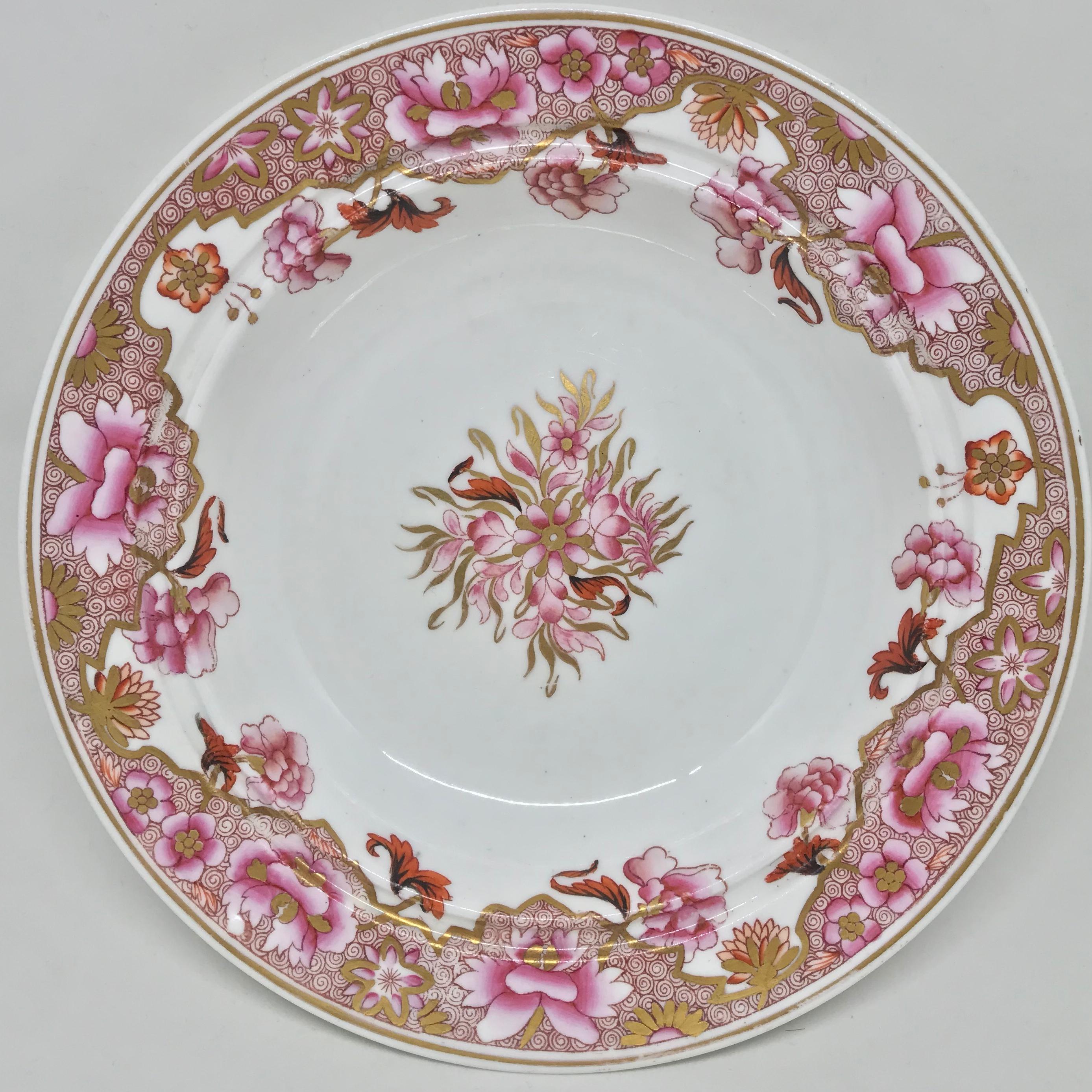 Spode pink and gilt plate. Early Spode porcelain plate with floral border in pinks reds and gold on white ground surrounding central floral spray. Under glaze marking for Spode, England, early 19th century.
Dimensions: 8