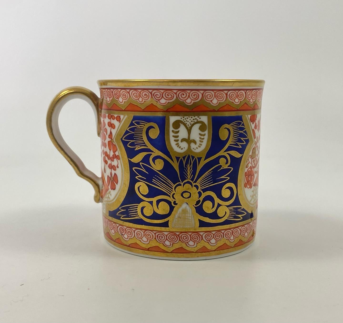 Spode porcelain coffee can, c. 1810. Painted in iron red enamels with stylised flowering plants, within shaped panels, on a cobalt blue ground, embellished with gilt floral scrollwork. The borders with a continuous Ruyi head motif.
Having a gilded