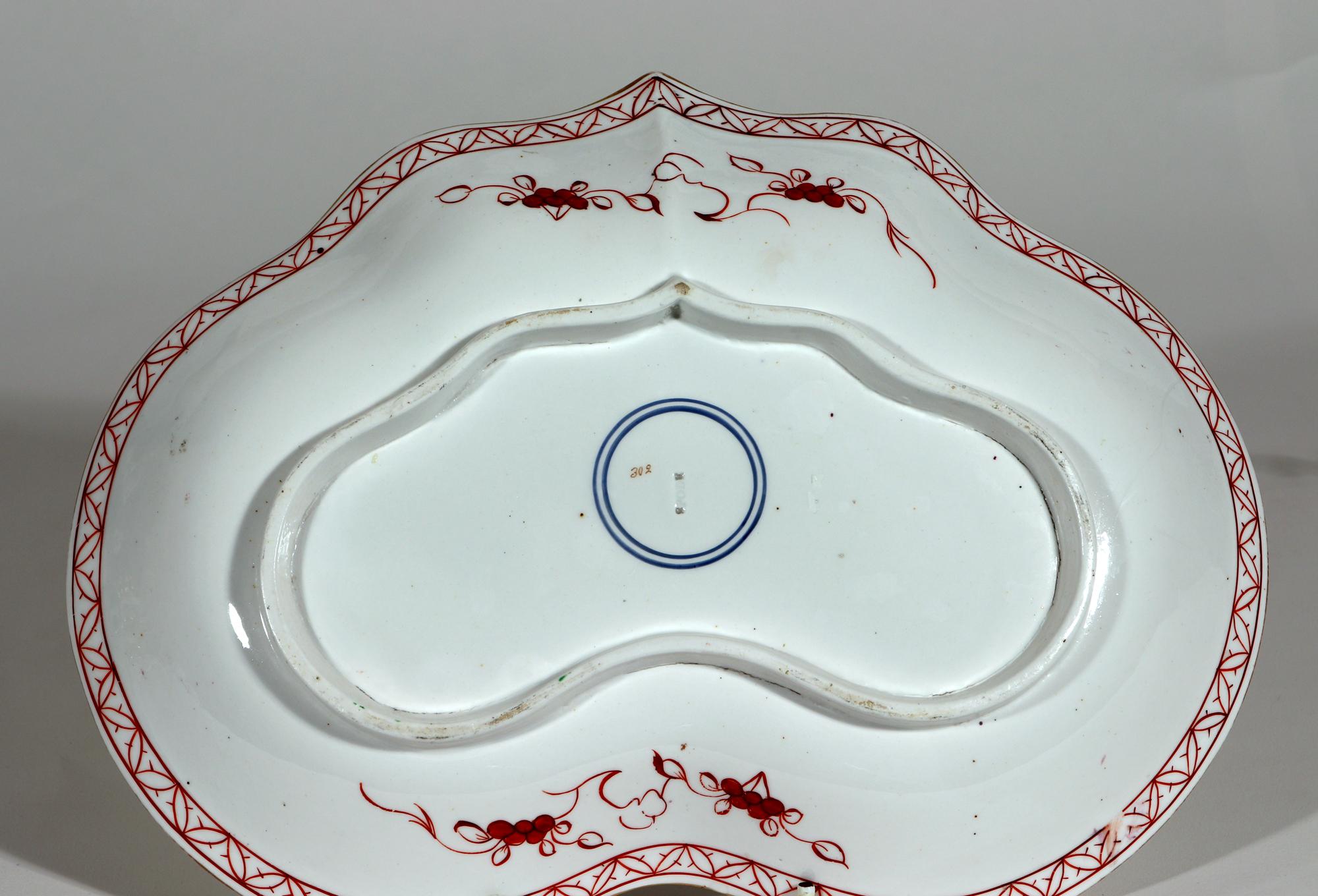 Spode Porcelain dessert service, 
Pattern # 302, 
Thirty-two pieces,
Circa 1800-1810

The Spode porcelain dessert service is numbered 302 mostly in gold. The pattern is very charming and rather unusual. The centers of each piece is painted with