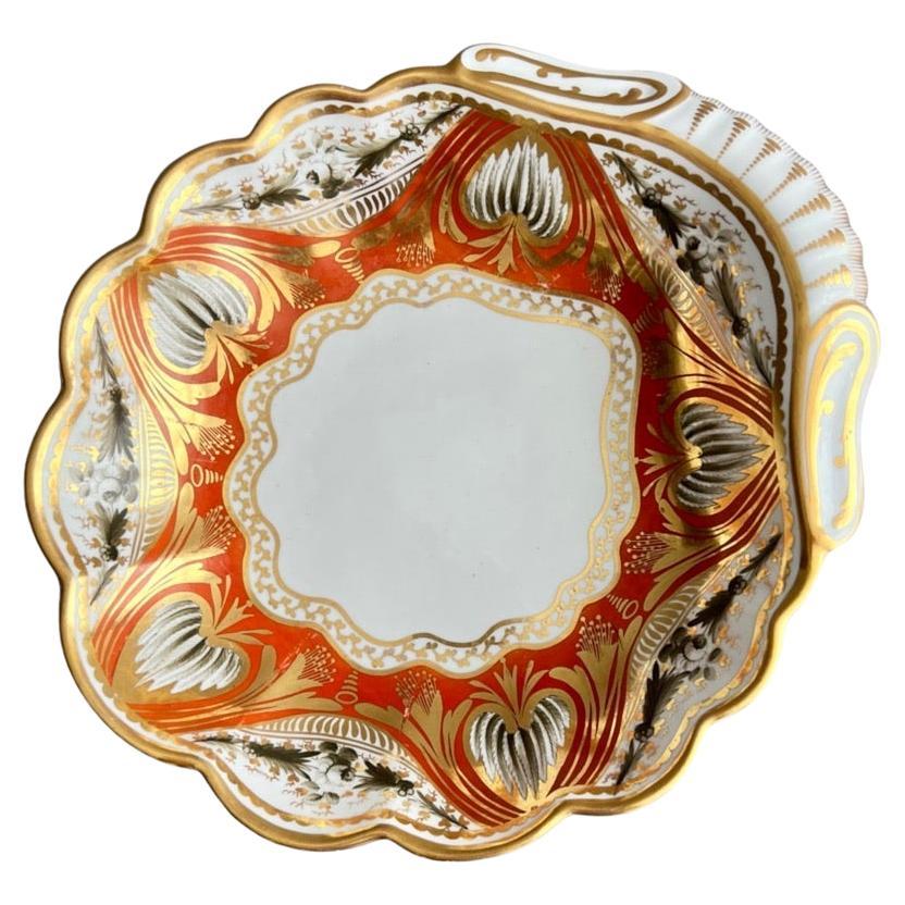 Piatto conchiglia in porcellana Spode, design neoclassico arancione e dorato, 1810 ca.