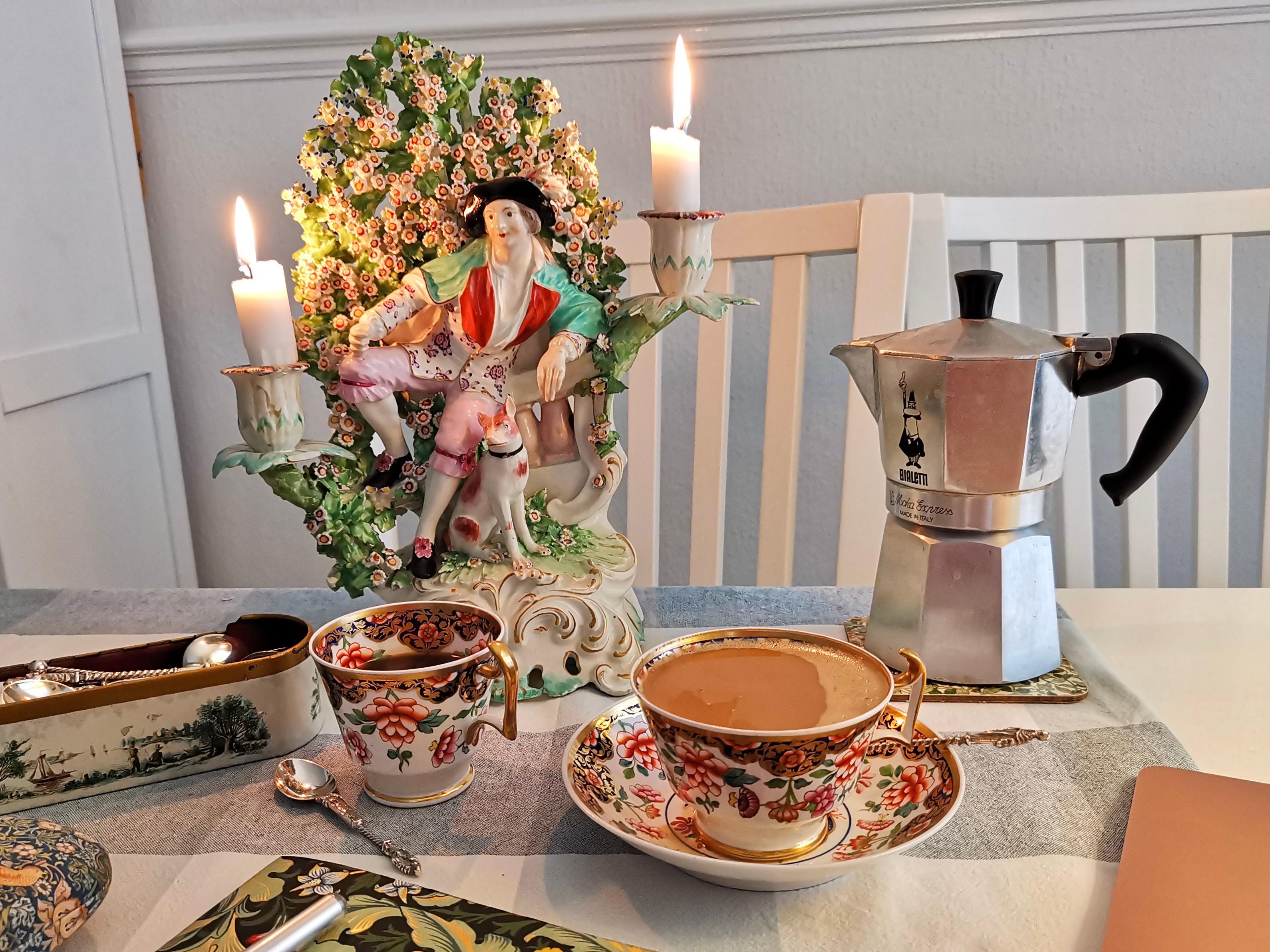This is a beautiful trio consisting of a teacup, a coffee cup and a saucer made by Spode around 1817. The set is decorated in an Imari pattern and potted in the famous London shape. 
 
In the late 18th and early 19th Century tea sets were sold in