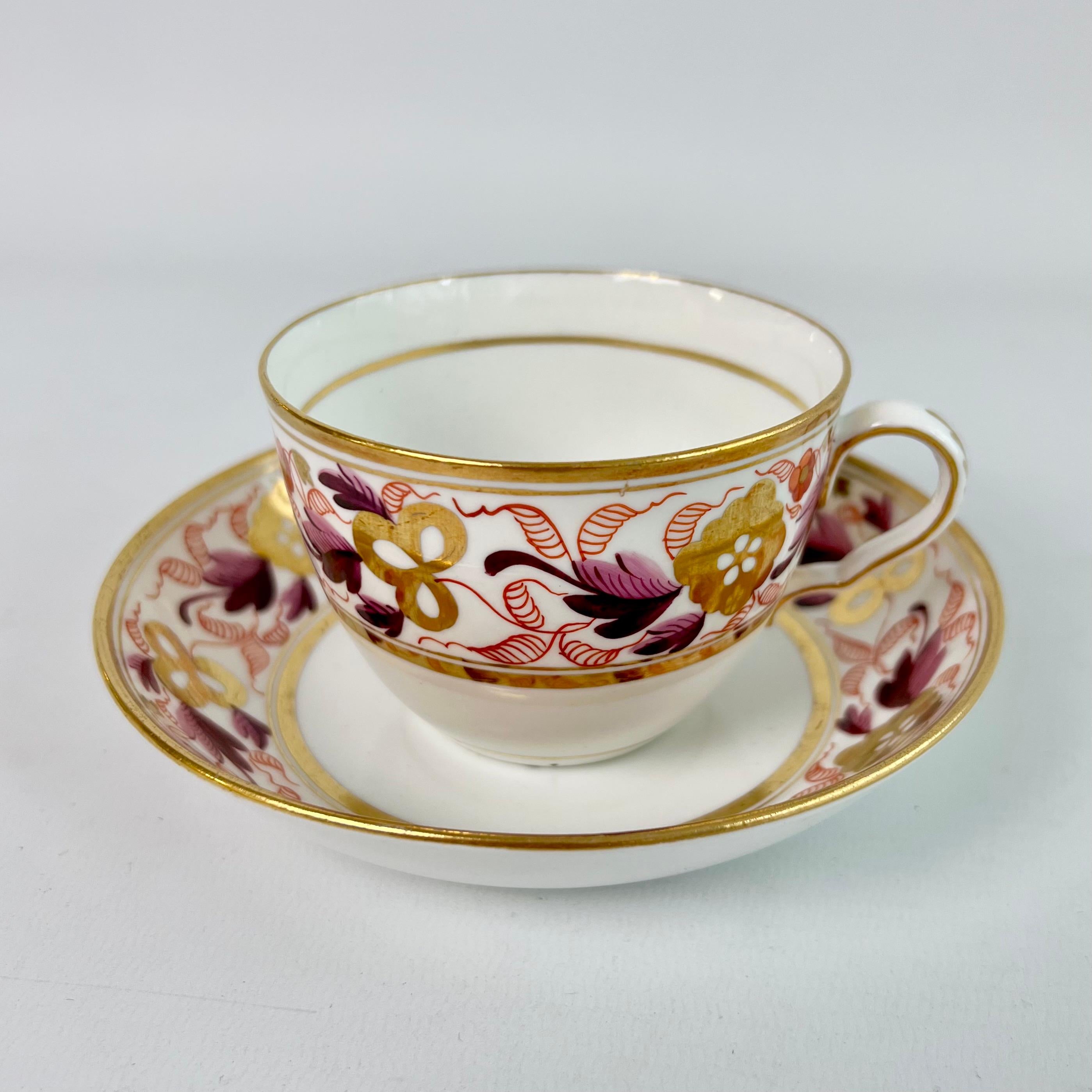 This is a beautiful true trio made by Spode around 1810. The set is decorated with pattern 889, which consists of a beautiful puce and gilt floral band. In the early 19th Century, cups and saucers were sold as 