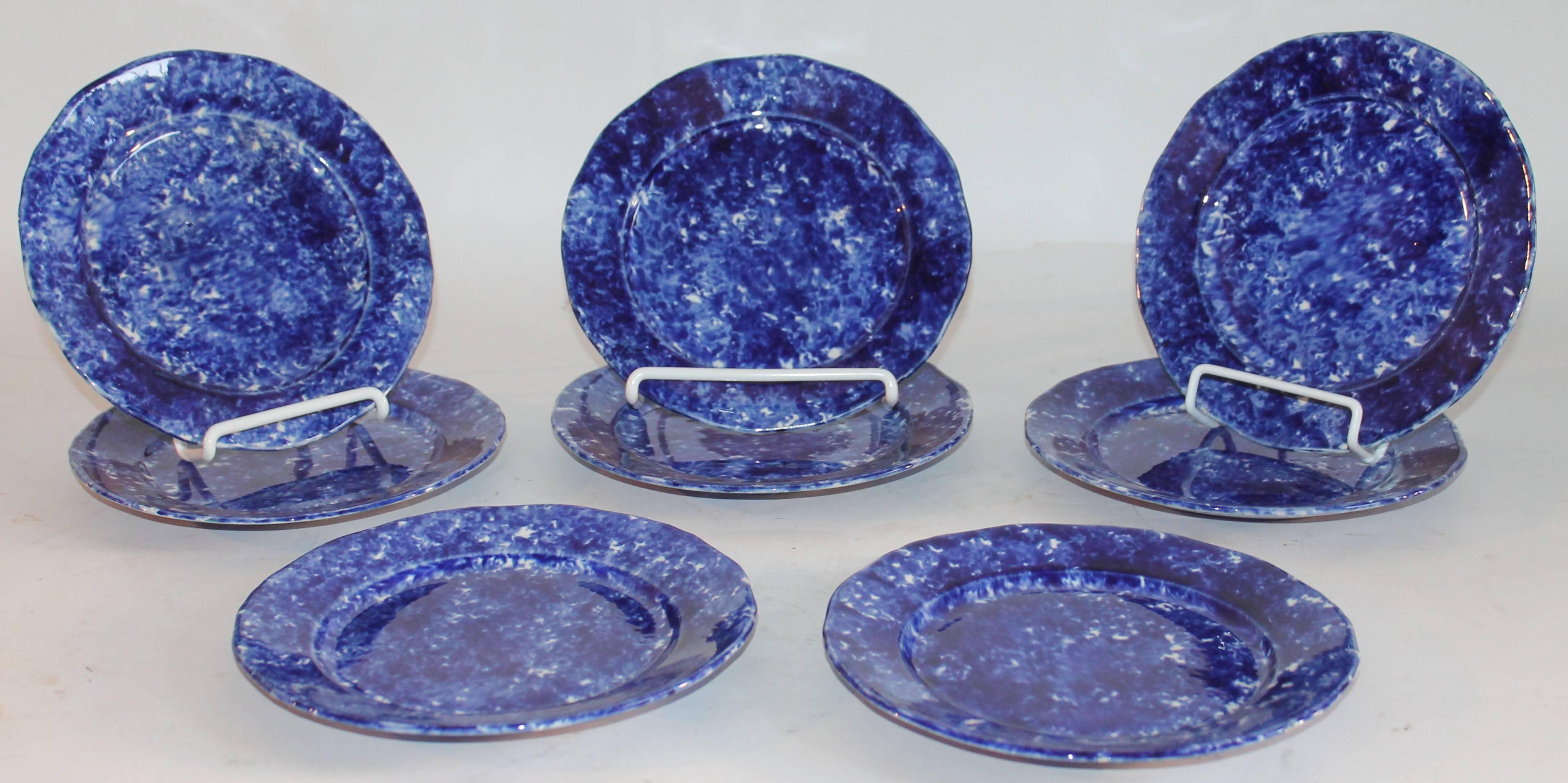 This amazing set of eight matching luncheon plates are in fine condition. They have a amazing glaze and coloration.