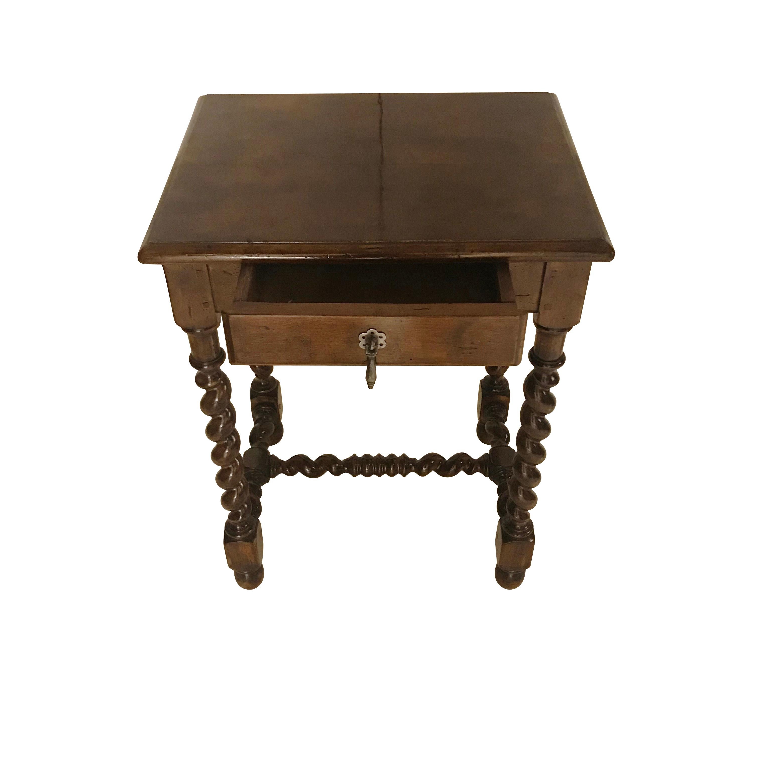 19th century French classic 19th century French walnut side table with single center drawer.
Traditional turned legs.
