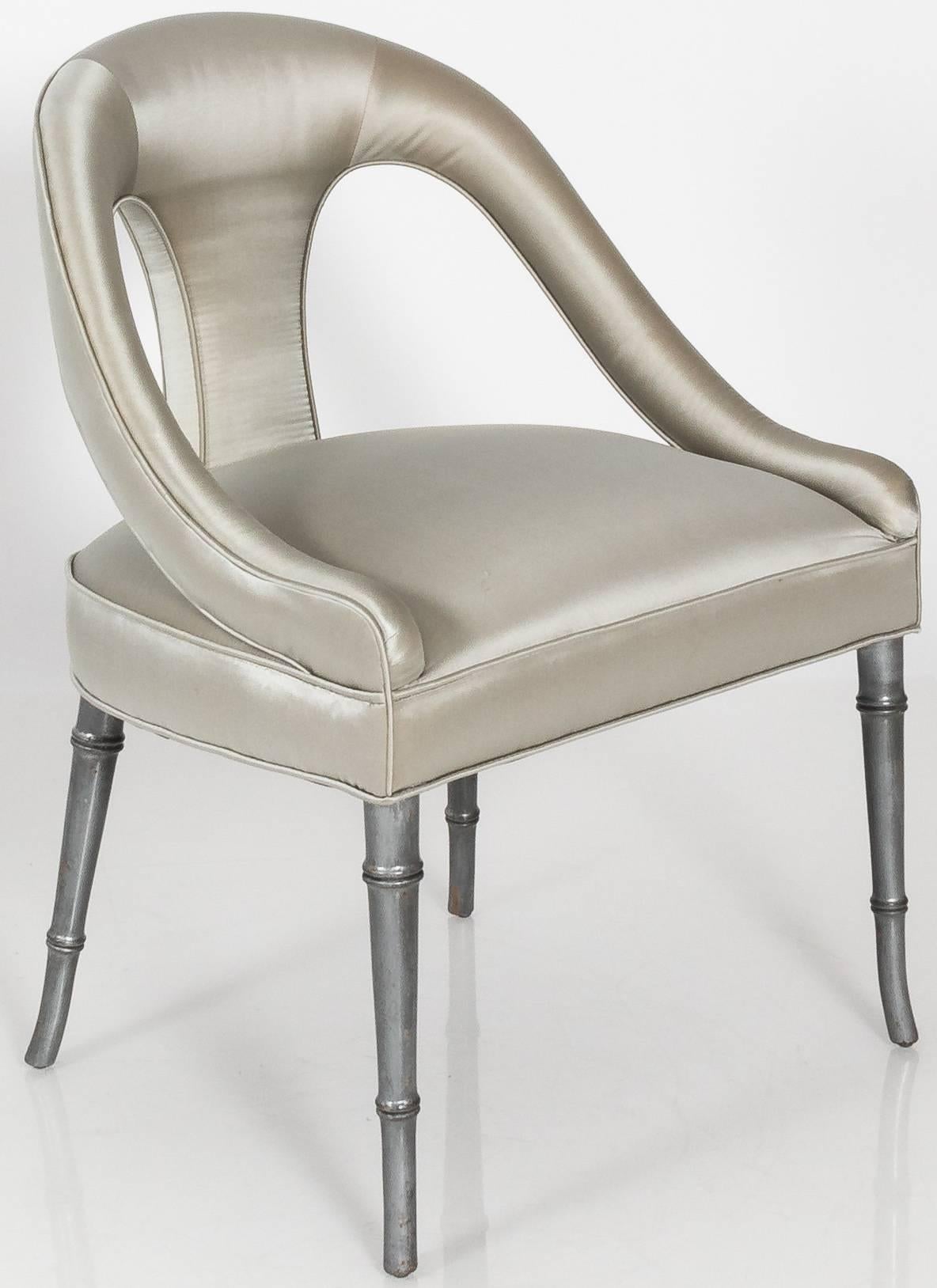 Elegant newly upholstered silver bamboo leg spoon back slipper chair. Newly upholstered in oyster silk satin. Measures: Seat is 18