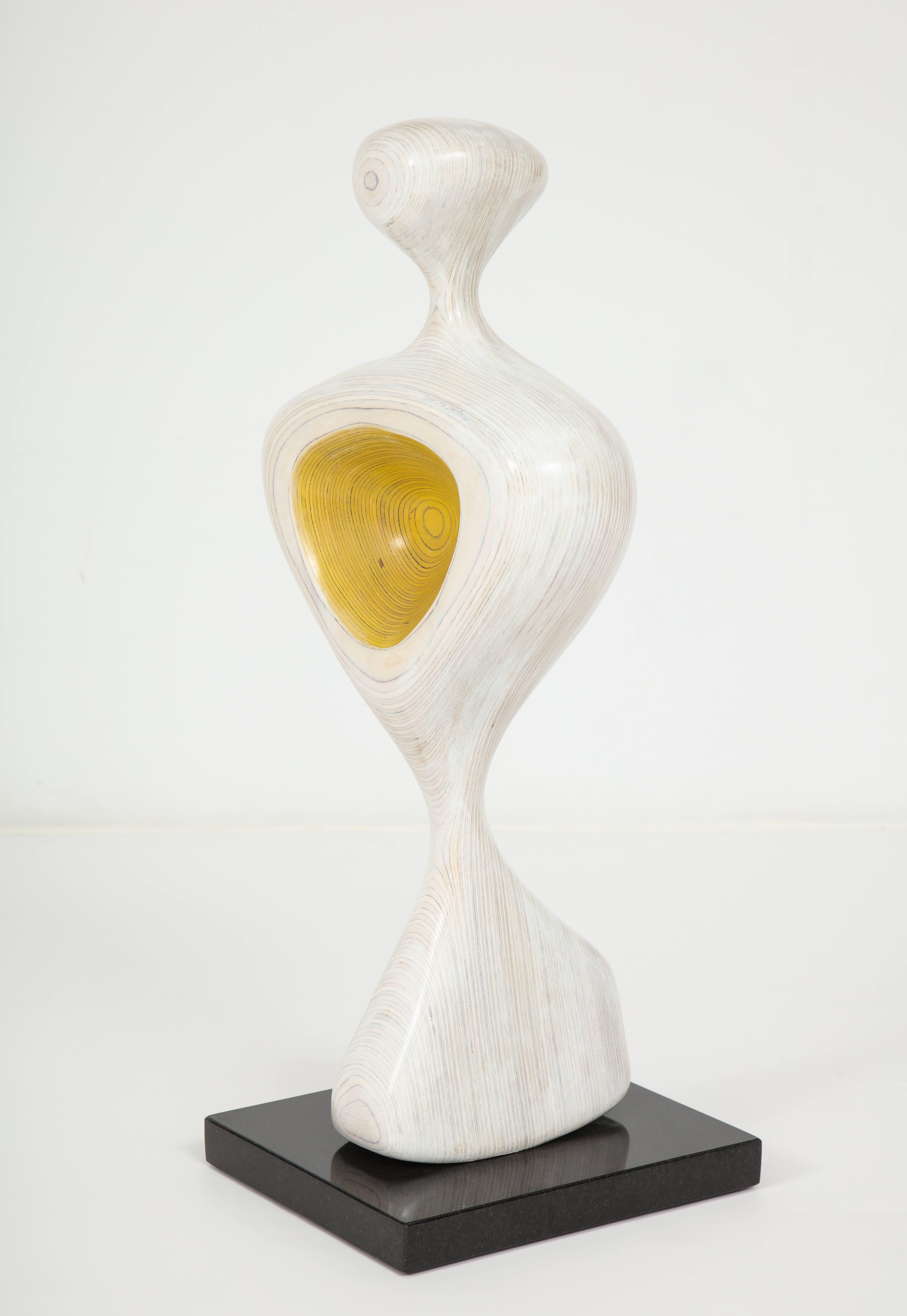 'Spoon' by Dick Shanley 
Laminated birchwood abstract sculpture on granite base. 
Size: 24