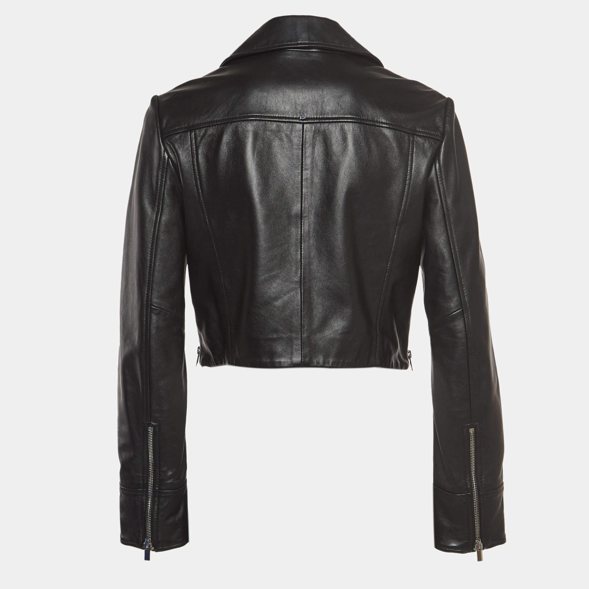 The biker jacket is the epitome of edgy sophistication. Crafted from high-quality leather, this piece features a sleek, tailored silhouette with zip detailing. Its rebellious charm and timeless appeal make it a must-have addition to any