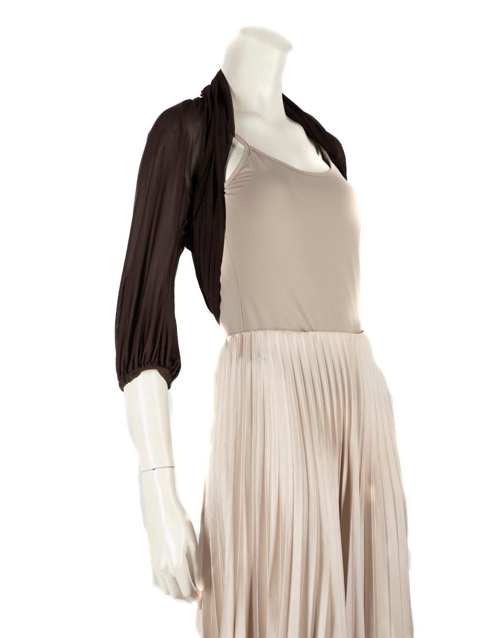 CONDITION is Very good. Minimal wear to the bolero jacket is evident. One pluck to the weave on the back neckline seam finishing on this used Max Mara designer resale item.

Details


Brown

Silk

Bolero

Long sleeves

Cropped

Drape detail

Knot