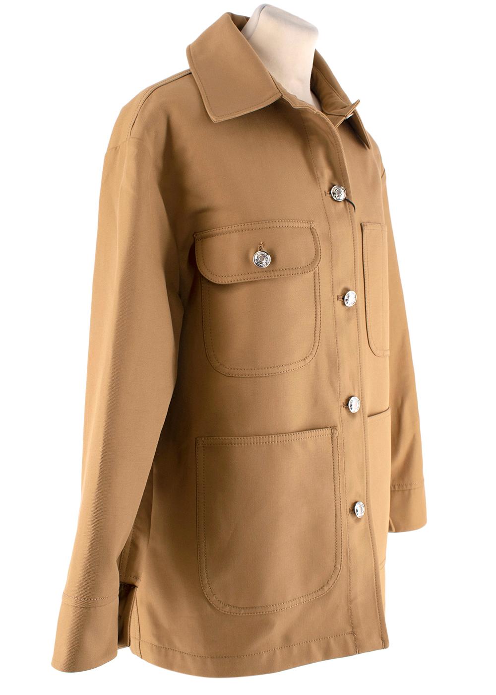 Sportmax Olmo Jacket 

-Single-breasted tobacco coloured jacket, straight cut, shirt collar, long sleeves, chest pocket with buttoned flap, buttoned fastening.

Measurements: 

Measurements:
47cm shoulder to shoulder 
45cm chest 
54cm waist 
54cm
