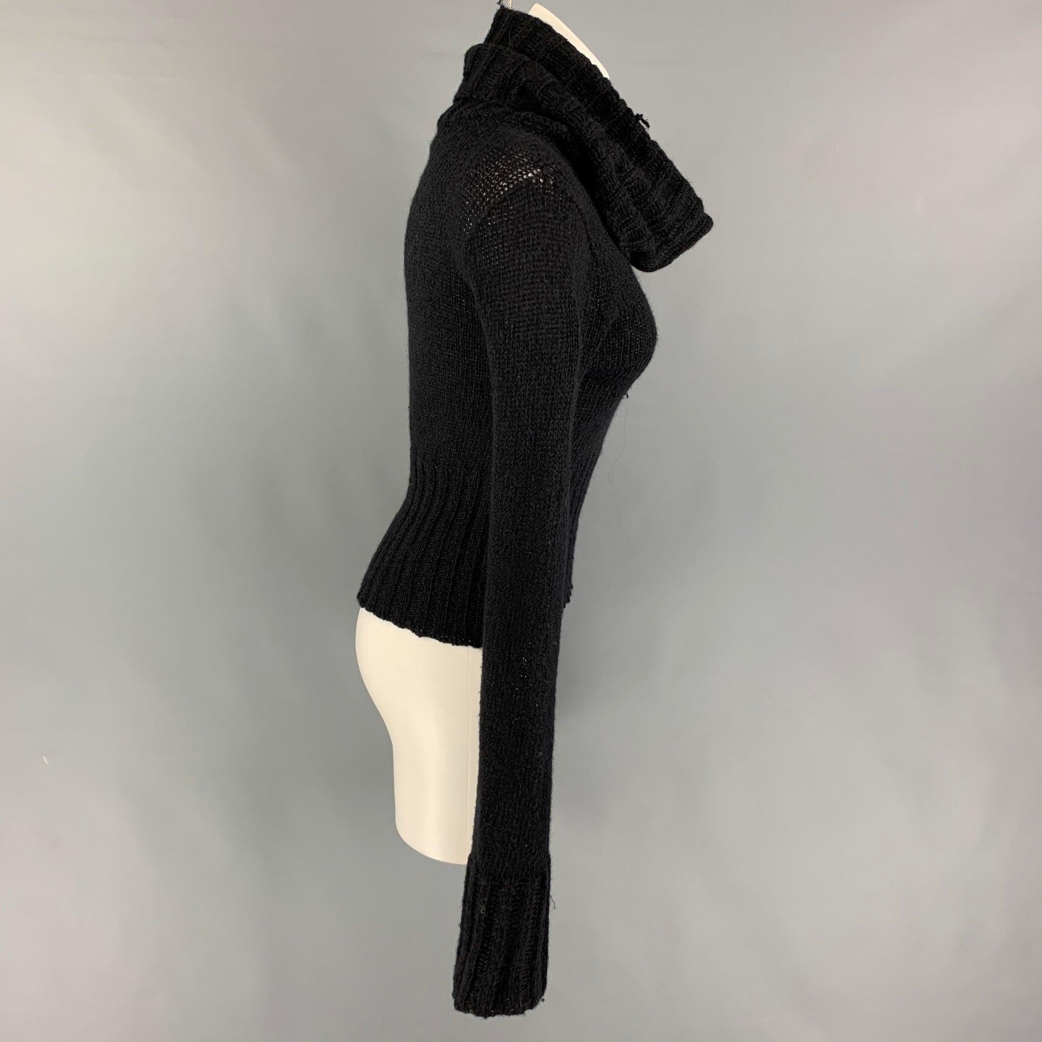 SPORTMAX sweater comes in a black nylon / mohair featuring long sleeves and a turtleneck.
Good
Pre-Owned Condition.
Mino wear.  

Marked:   M  

Measurements: 
 
Shoulder: 17 inches  Bust:
34 inches  Sleeve: 34 inches  Length: 19.5 inches 
  
  
