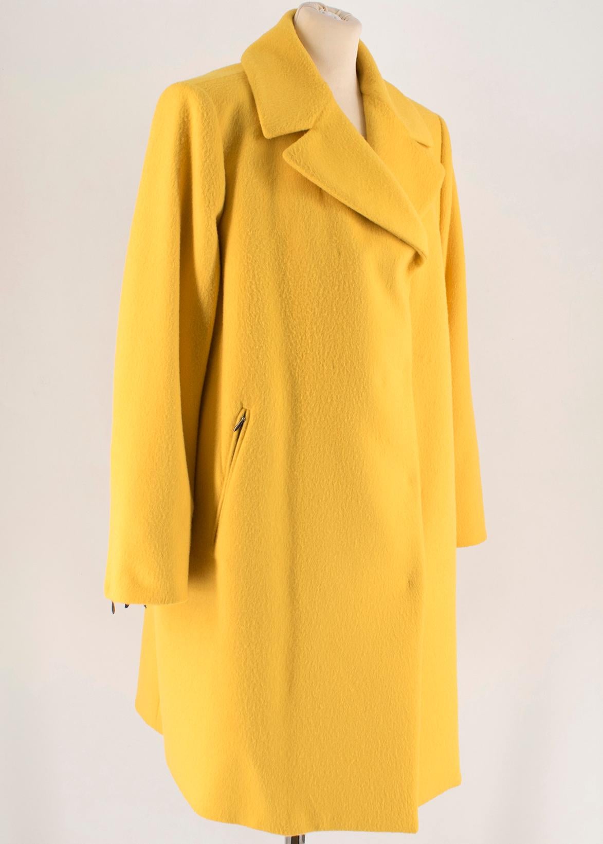 Sportmax Yellow Wool & Cashmere Zarda Coat
-Yellow, wool blend
-Double breasted 
-Two functional side zip pockets
-Zipped cuffs
-Back vent 
-Notch lapel 

Please note, these items are pre-owned and may show some signs of storage, even when unworn