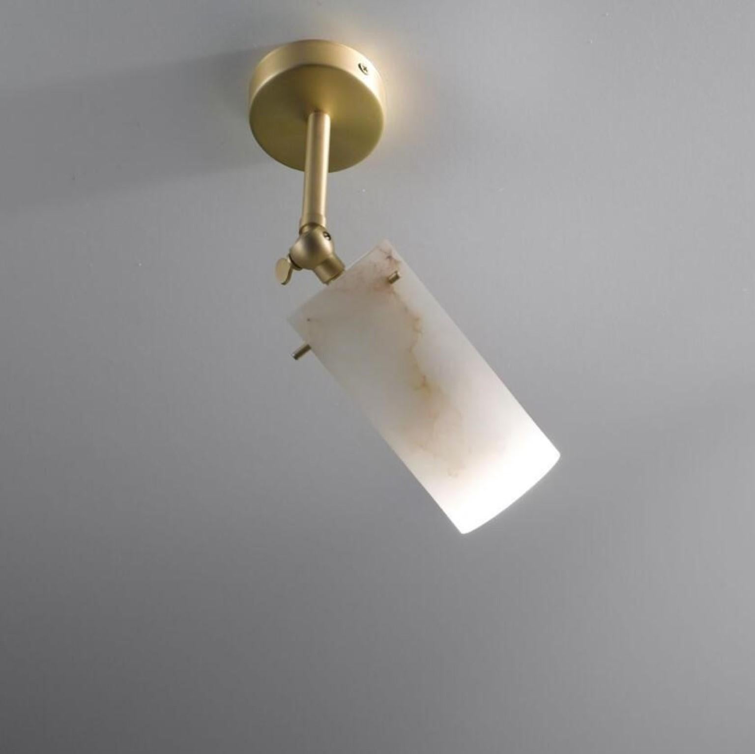 Spotlight Poseidone #1 by Alabastro Italiano
Dimensions: W 8 x D 11 x H 15 cm
Materials: Italian white Alabaster, Brushed Brass
Other finishes available.
Light Source 1 x GU10 LED 6 Watt, Tot. 519 Lumen, 3000 k, 220 V

All our lamps can be wired
